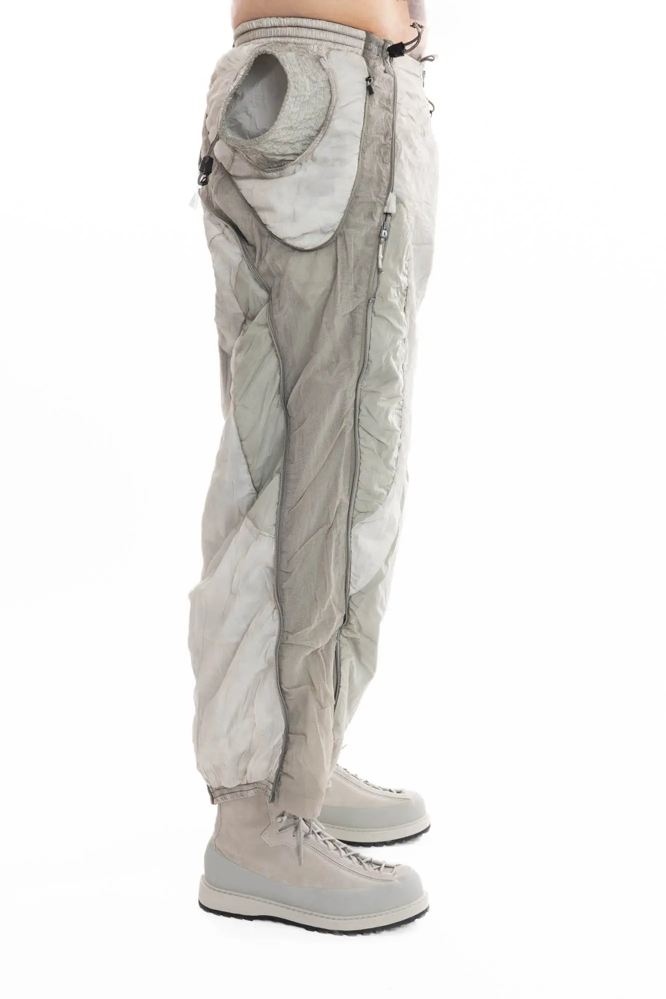 Hamcus, Mens Trousers, Light Grey, Dirt White, Straight Leg, Leg Zippers, Multi-Fabric, Translucent Inserts, Transparent, Zip Fly, Side Drawcord Pockets, Drawcord Elastic Waistband, Side Portrait. 