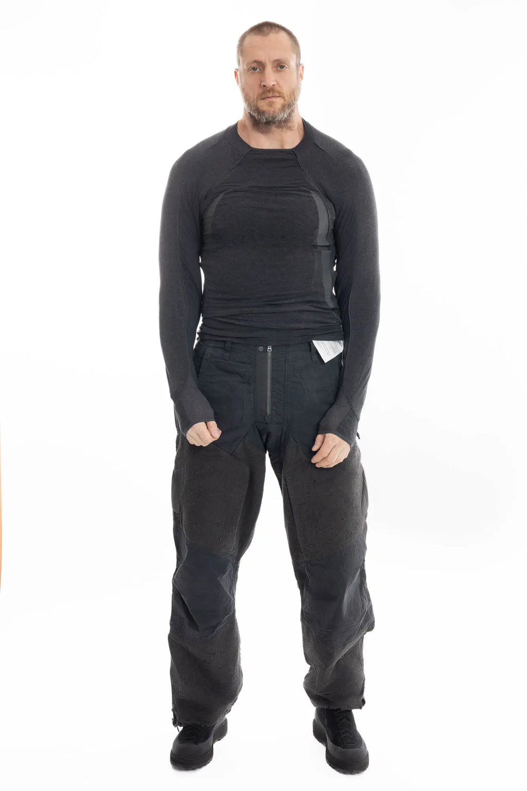 Hamcus, Mens Trousers, Black, Dark Grey, Straight Leg, Adjustable Cuffs, Side Pockets, Back Pockets, Belt Loops, Zip Fly, Multi Panel Construction, Leg Zips, Torn Design, Snap Closure, Drawcord Pockets, Vislon Zippers, Full Body Front View. 