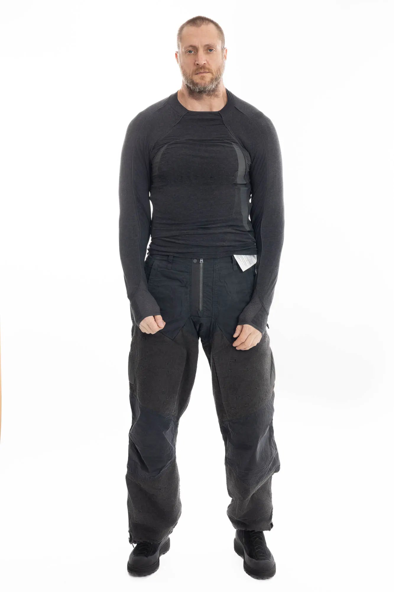Hamcus, Mens Trousers, Black, Dark Grey, Straight Leg, Adjustable Cuffs, Side Pockets, Back Pockets, Belt Loops, Zip Fly, Multi Panel Construction, Leg Zips, Torn Design, Snap Closure, Drawcord Pockets, Vislon Zippers, Full Body Front View. 