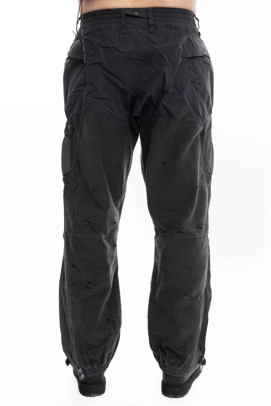Hamcus, Mens Trousers, Black, Dark Grey, Straight Leg, Adjustable Cuffs, Side Pockets, Back Pockets, Belt Loops, Zip Fly, Multi Panel Construction, Leg Zips, Torn Design, Snap Closure, Drawcord Pockets, Vislon Zippers, Back Portrait. 