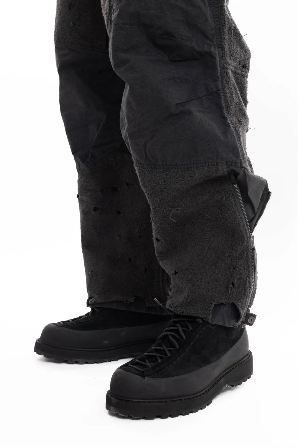 Hamcus, Mens Trousers, Black, Dark Grey, Straight Leg, Adjustable Cuffs, Side Pockets, Back Pockets, Belt Loops, Zip Fly, Multi Panel Construction, Leg Zips, Torn Design, Snap Closure, Drawcord Pockets, Vislon Zippers, Leg Fit Showcase. 