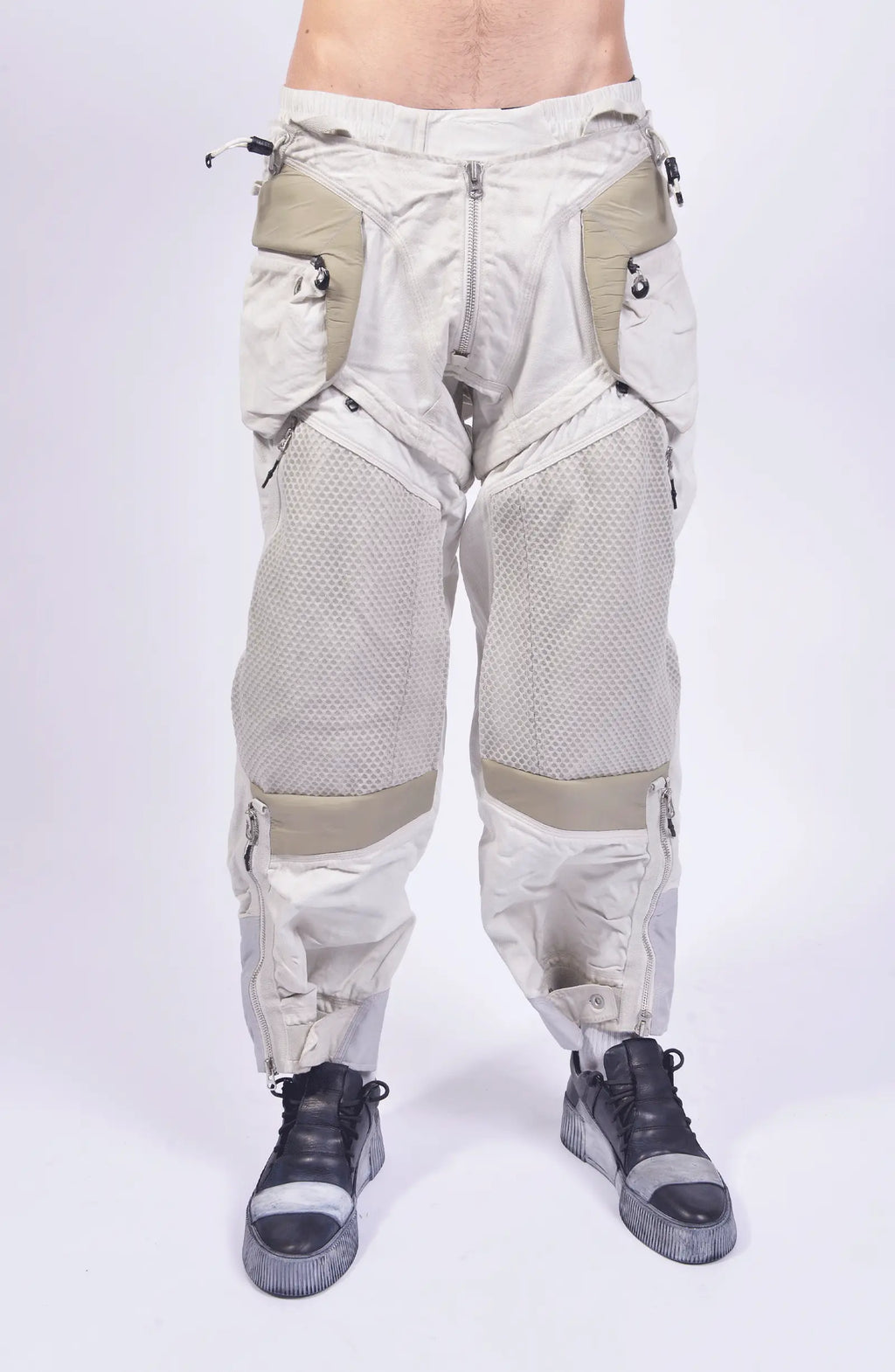 Hamcus, Mens Pants, White, Drawcord Pockets, Side Pockets, Leg Zippers, Adjustable Cuffs, Breathable Mesh, Breathable Legs, Back Pockets, Ventilation Zip Openings, Multi-Fabric Construction, Patchwork Design, Honeycomb Panels, Foam Modules, Front Portrait. 