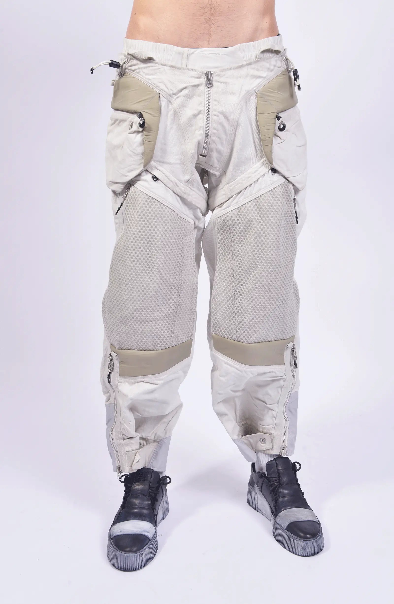 Hamcus, Mens Pants, White, Drawcord Pockets, Side Pockets, Leg Zippers, Adjustable Cuffs, Breathable Mesh, Breathable Legs, Back Pockets, Ventilation Zip Openings, Multi-Fabric Construction, Patchwork Design, Honeycomb Panels, Foam Modules, Front Portrait. 