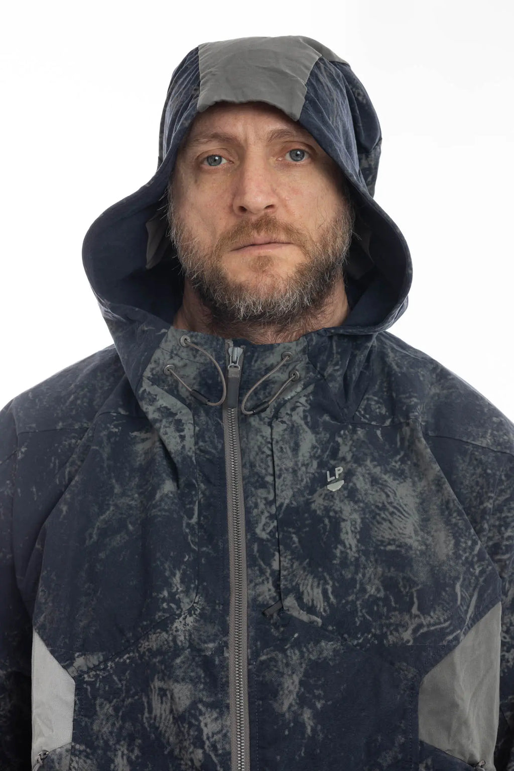 Hamcus, Mens Jacket, Geomapping Scan Print, Blue, Gray, Black, Hooded, Drawcord Hood, Side Pockets, Full Zip, Chest Logo, Waterproof, Grey Panel Inserts, Cotton, Polyamide, Elastic Cuffs and Hem, Adjustable Hem, Zip Pockets, Front Portrait Hooded Close-up. 