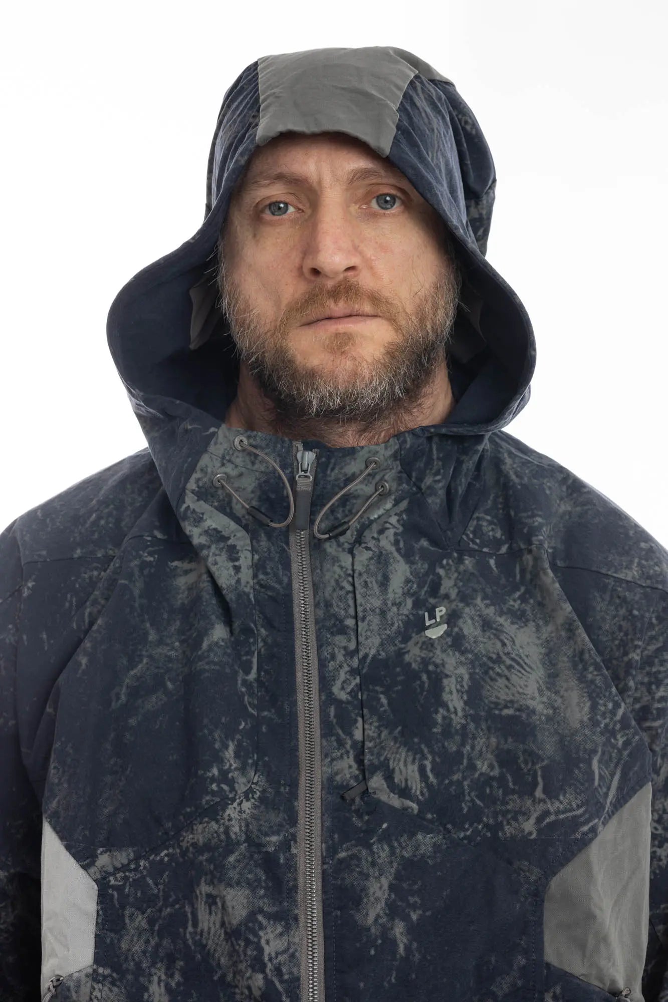 Hamcus, Mens Jacket, Geomapping Scan Print, Blue, Gray, Black, Hooded, Drawcord Hood, Side Pockets, Full Zip, Chest Logo, Waterproof, Grey Panel Inserts, Cotton, Polyamide, Elastic Cuffs and Hem, Adjustable Hem, Zip Pockets, Front Portrait Hooded Close-up. 