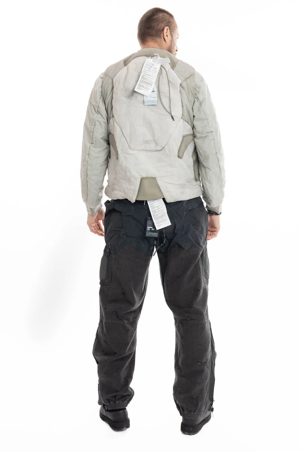 Hamcus, Mens Jacket, Beige, Light Grey, Light Brown, Full Zip, Removable Sleeves, Dual Module Jacket, Side Zip Pockets, Quilted with Thermolite, DWR Coated, Insulated, Ribbed Neck and Cuffs, Panel Construction, Removable Lining, Full Body Back View. 