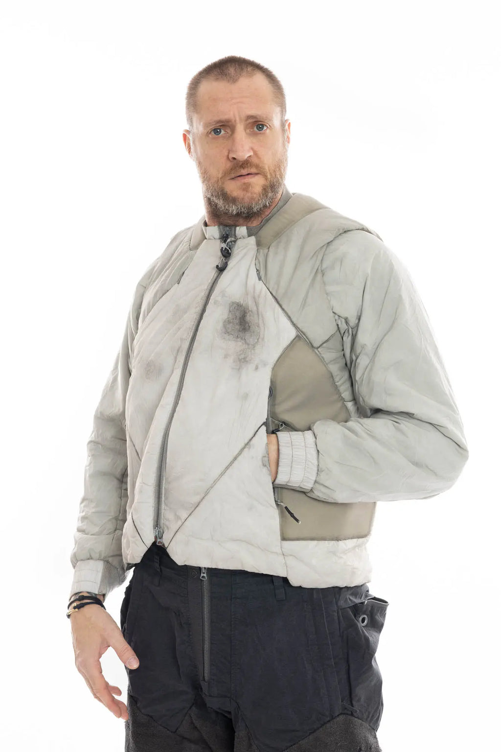 Hamcus, Mens Jacket, Beige, Light Grey, Light Brown, Full Zip, Removable Sleeves, Dual Module Jacket, Side Zip Pockets, Quilted with Thermolite, DWR Coated, Insulated, Ribbed Neck and Cuffs, Panel Construction, Removable Lining, Front 3/4 Portrait. 