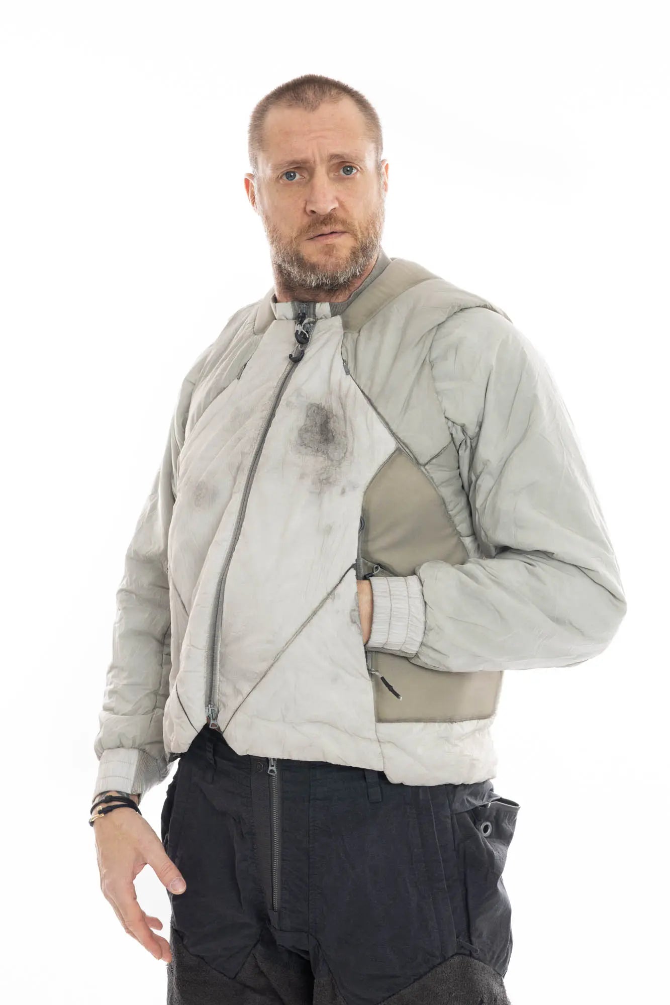 Hamcus, Mens Jacket, Beige, Light Grey, Light Brown, Full Zip, Removable Sleeves, Dual Module Jacket, Side Zip Pockets, Quilted with Thermolite, DWR Coated, Insulated, Ribbed Neck and Cuffs, Panel Construction, Removable Lining, Front 3/4 Portrait. 