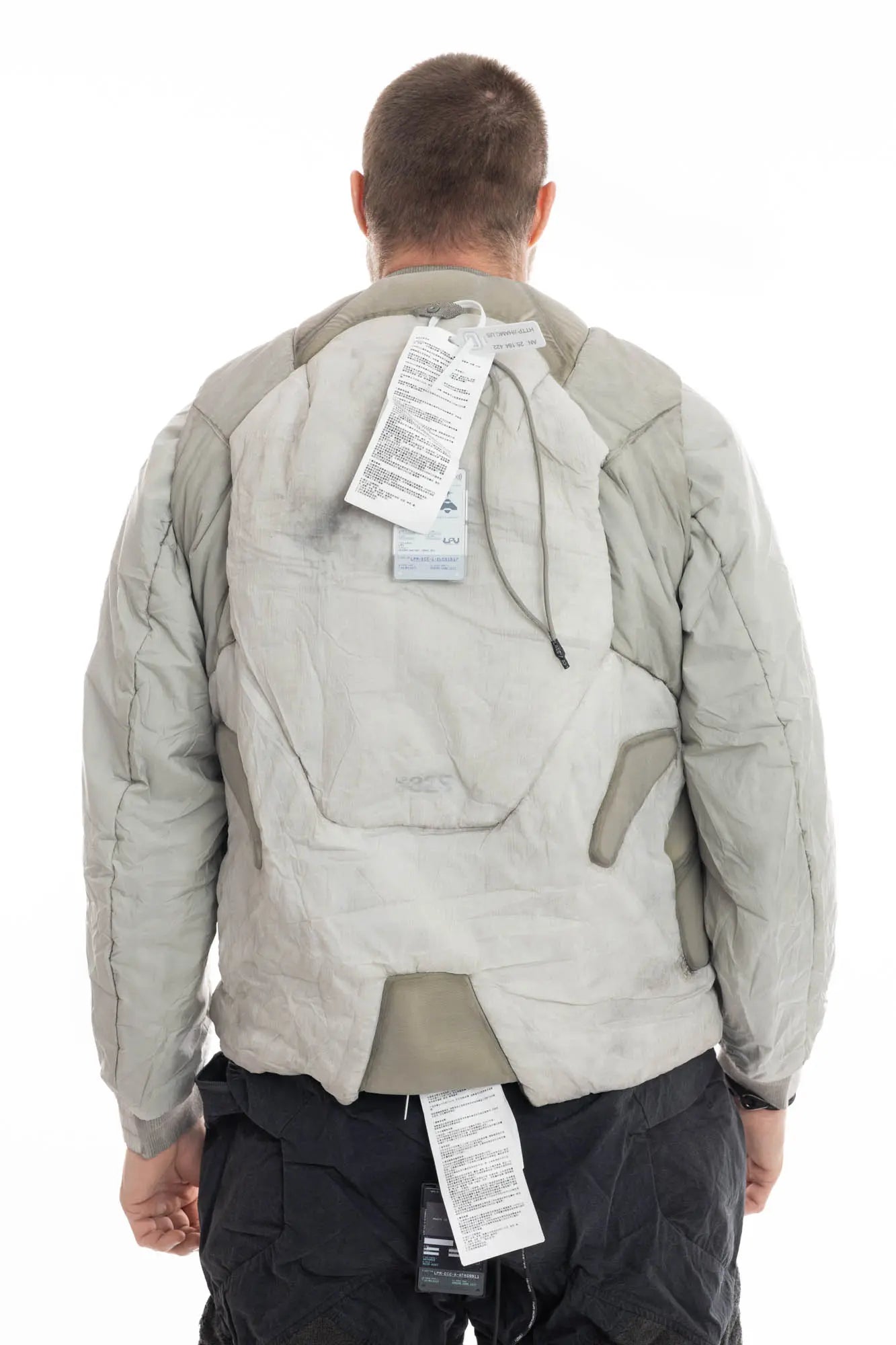 Hamcus, Mens Jacket, Beige, Light Grey, Light Brown, Full Zip, Removable Sleeves, Dual Module Jacket, Side Zip Pockets, Quilted with Thermolite, DWR Coated, Insulated, Ribbed Neck and Cuffs, Panel Construction, Removable Lining, Back Portrait Full Form. 