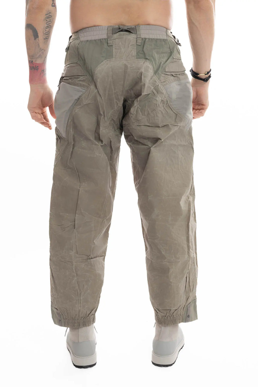 Hamcus, Mens Trousers, Olive, Beige, Light Brown, Smeared, Side Zips, Side ZIppers, Adjustable Cuffs, Elastic Drawcord Waistband, Belt Loops, Zip-Fly, Back Pockets, Polyester, Polyamide, Translucent, Transparent, Straight Leg, Wide-fit, Back Portrait. 