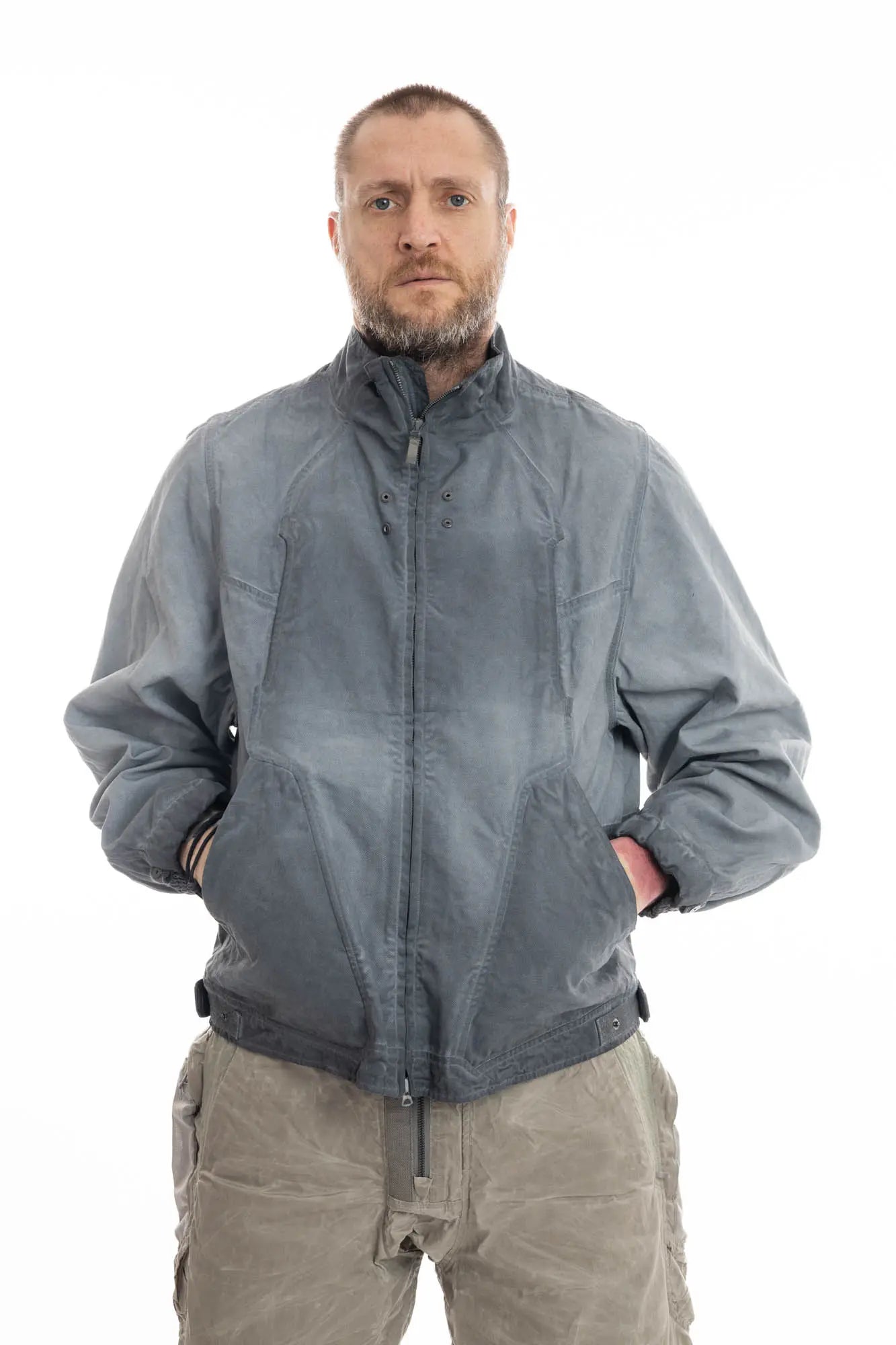 Hamcus, Mens Jacket, Grey, Hamcus EARS-6 Loner's Combat Jacket in Fiend Grey – technical biomimicry design with multiple functional pockets and articulated fit, Side Pockets, Adjustable Cuffs, Snap Closure, Full Zip, Front Portrait Hands in Pockets. 
