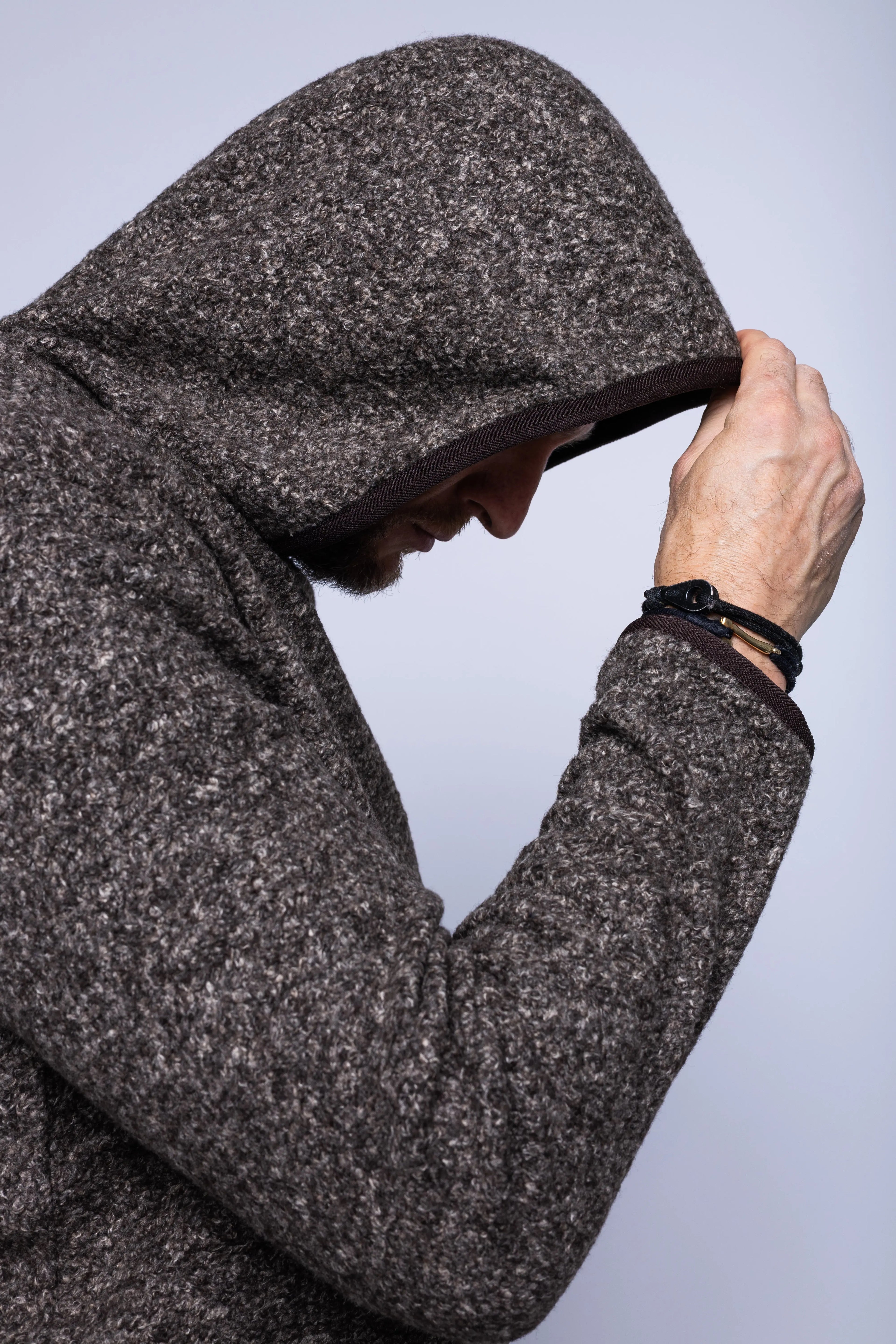 K-Way, Mens Sweatshirt, Black Brown Combo, Hooded, Aviron Wool Blend, Elasticated Hem and Cuffs, Long Sleeves, Melange, Insulated, Thermal, Side View Pulling the Hood. 