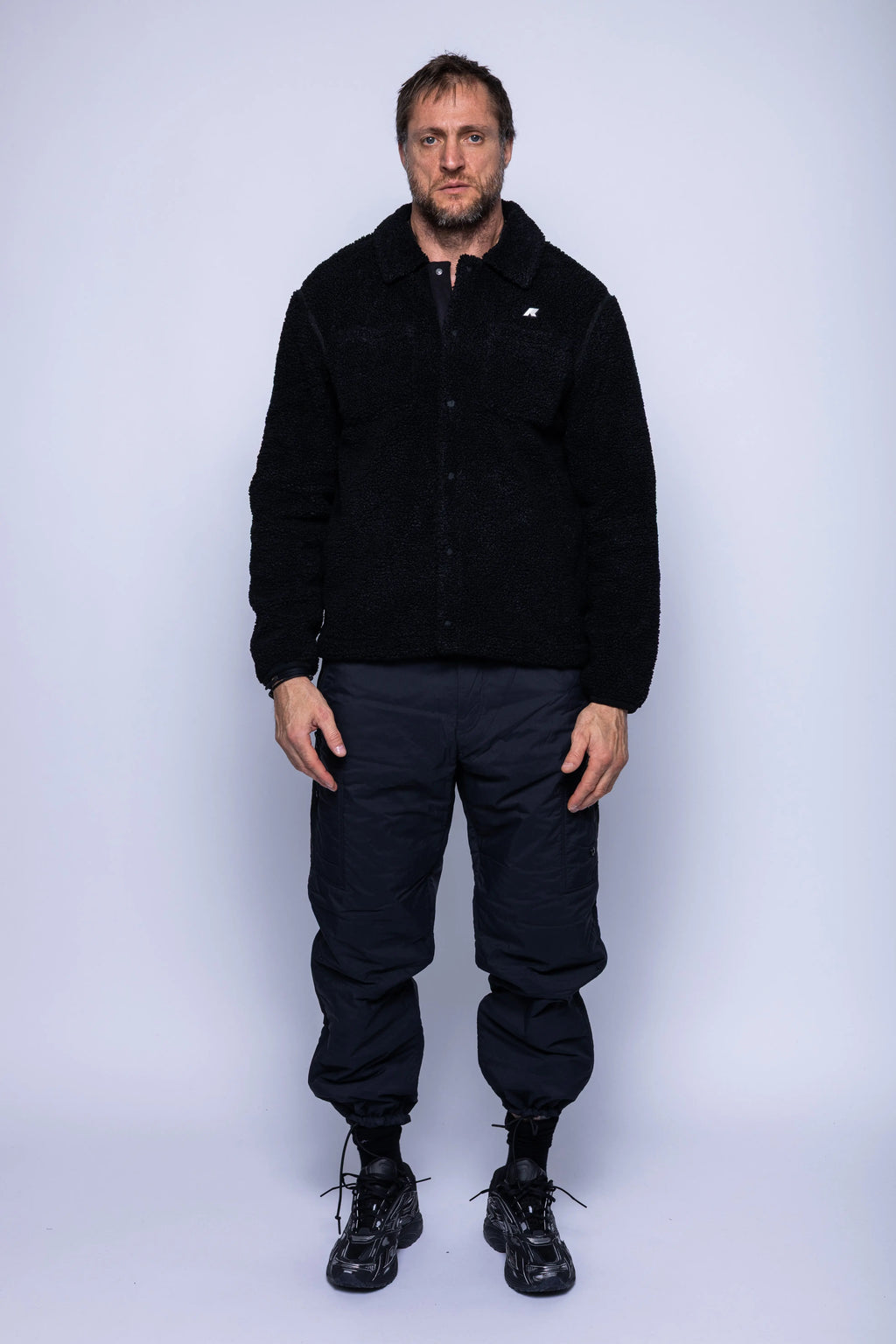 K-Way, Mens Polar, Black, Snap Button Closure, Side Pockets, Elasticated Cuffs, Brushed Fleece, Double-Layer Fleece, Silicone Logo-Patch, Shirt Collar, Full Body Front View. 