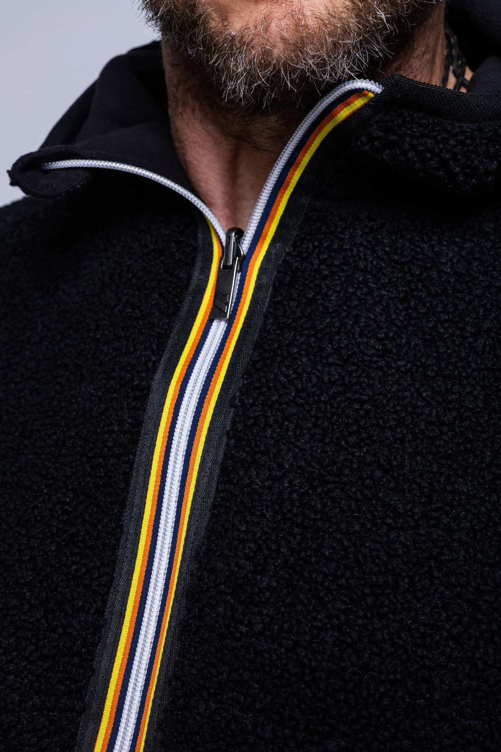 K-Way, Mens Jacket, Black, Polar, Reversible, Double-Faced, Sherpa Quality, Full-Zip, Side Pockets, Long Sleeves, Hooded, Elasticated Cuffs and Hem, Branded Zippers, Zipper Puller Close-up. 