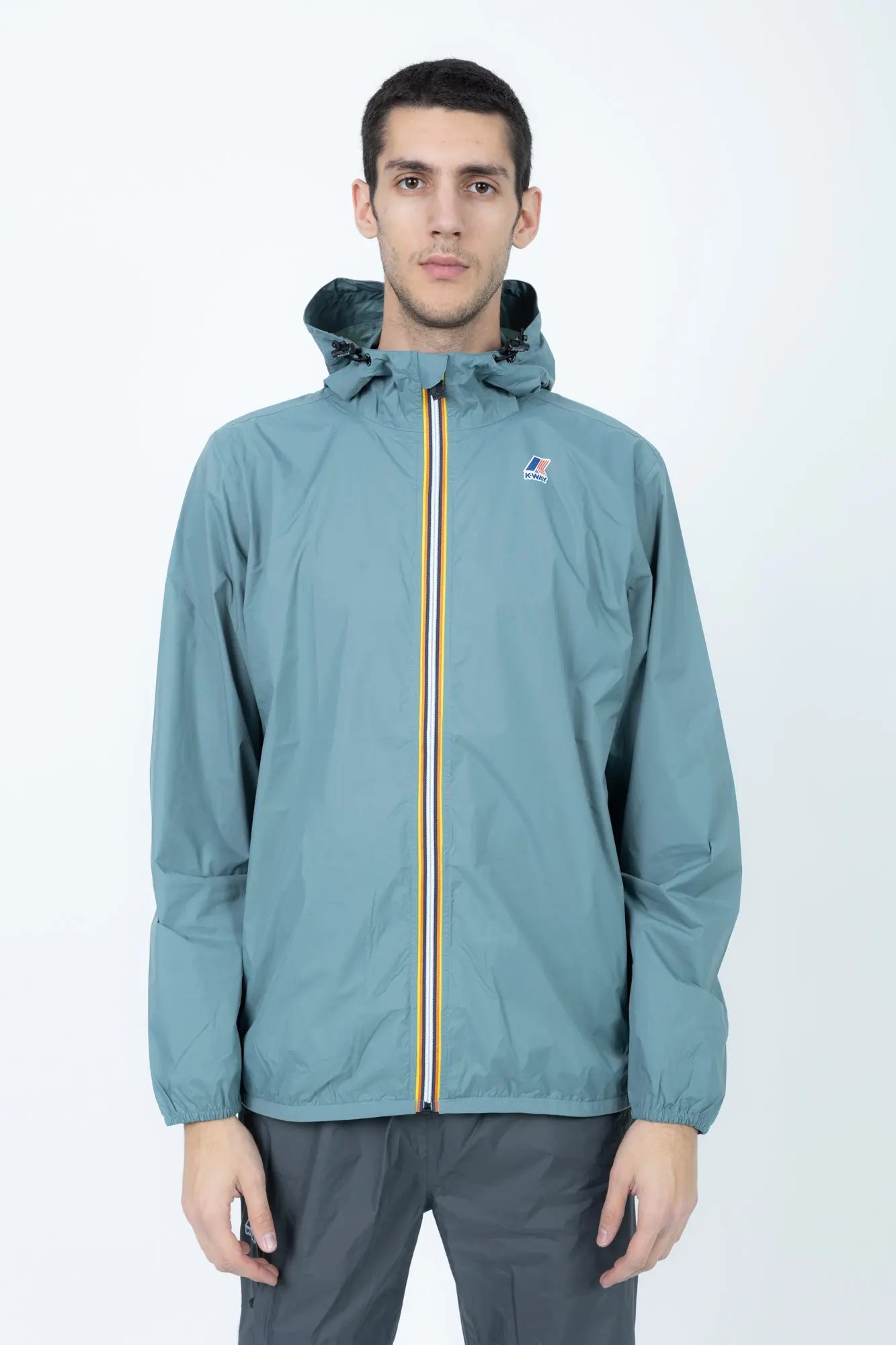 K-Way, Mens Jacket, Green Iron, Petrol Green, Unisex, Full-Zip, Chest Logo, Branded Zippers, Long Sleeves, Waterproof 10000 mm water column, Windproof 10000 g/sqm/24h, Heat Taped Seams, Elasticated Cuffs and Hem, Hooded, Drawcord, Front Portrait. 