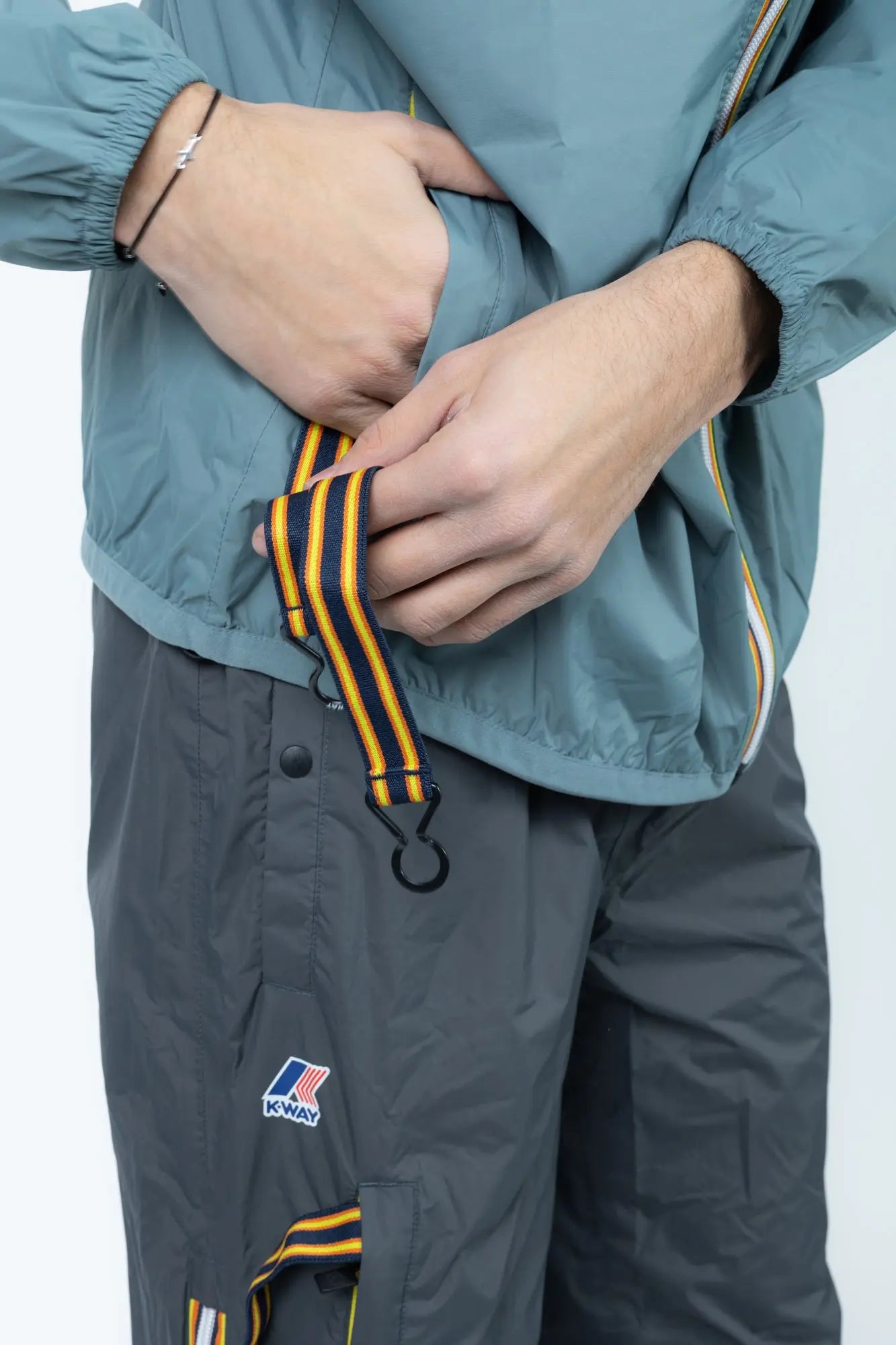 K-Way, Mens Jacket, Green Iron, Petrol Green, Unisex, Full-Zip, Chest Logo, Branded Zippers, Long Sleeves, Waterproof 10000 mm water column, Windproof 10000 g/sqm/24h, Heat Taped Seams, Elasticated Cuffs and Hem, Hooded, Drawcord, Side Pockets Showcase. 