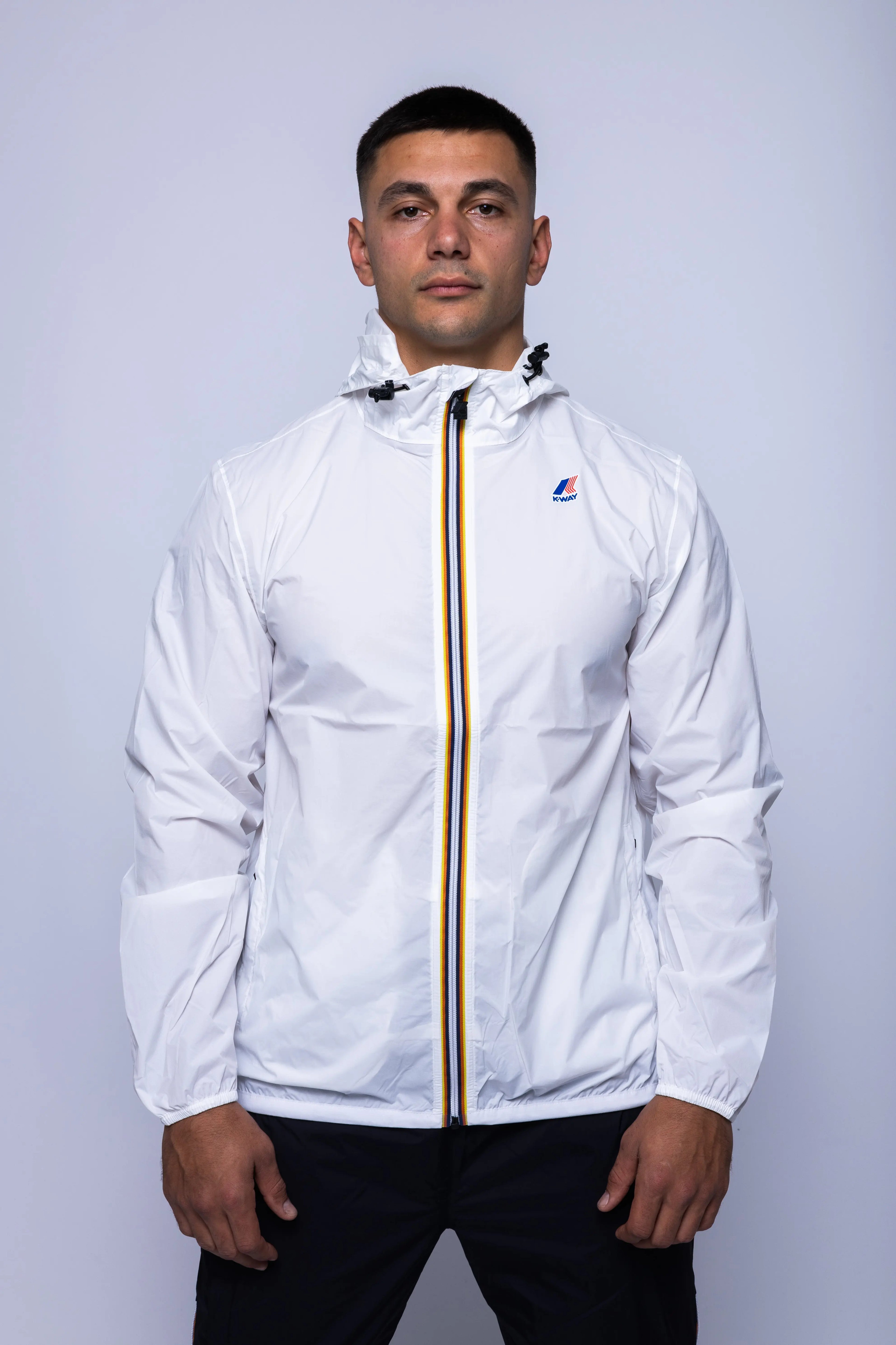 K-Way, Mens Jacket, White, Unisex, Full-Zip, Chest Logo, Branded Zippers, Long Sleeves, Waterproof 10000 mm water column, Windproof 10000 g/sqm/24h, Heat Taped Seams, Elasticated Cuffs and Hem, Hooded, Drawcord, Front Portrait. 