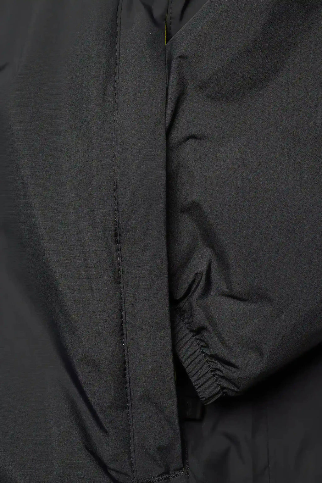 Kway, Mens Jacket, Black, Windbreaker, PrimaLoft, Side Pockets, Full Zip, Signature Zip Tape, Branded Zippers, Zip Pockets, Hooded, Drawcords, Elasticated Cuffs and Hem, Side Pockets Close-up. 