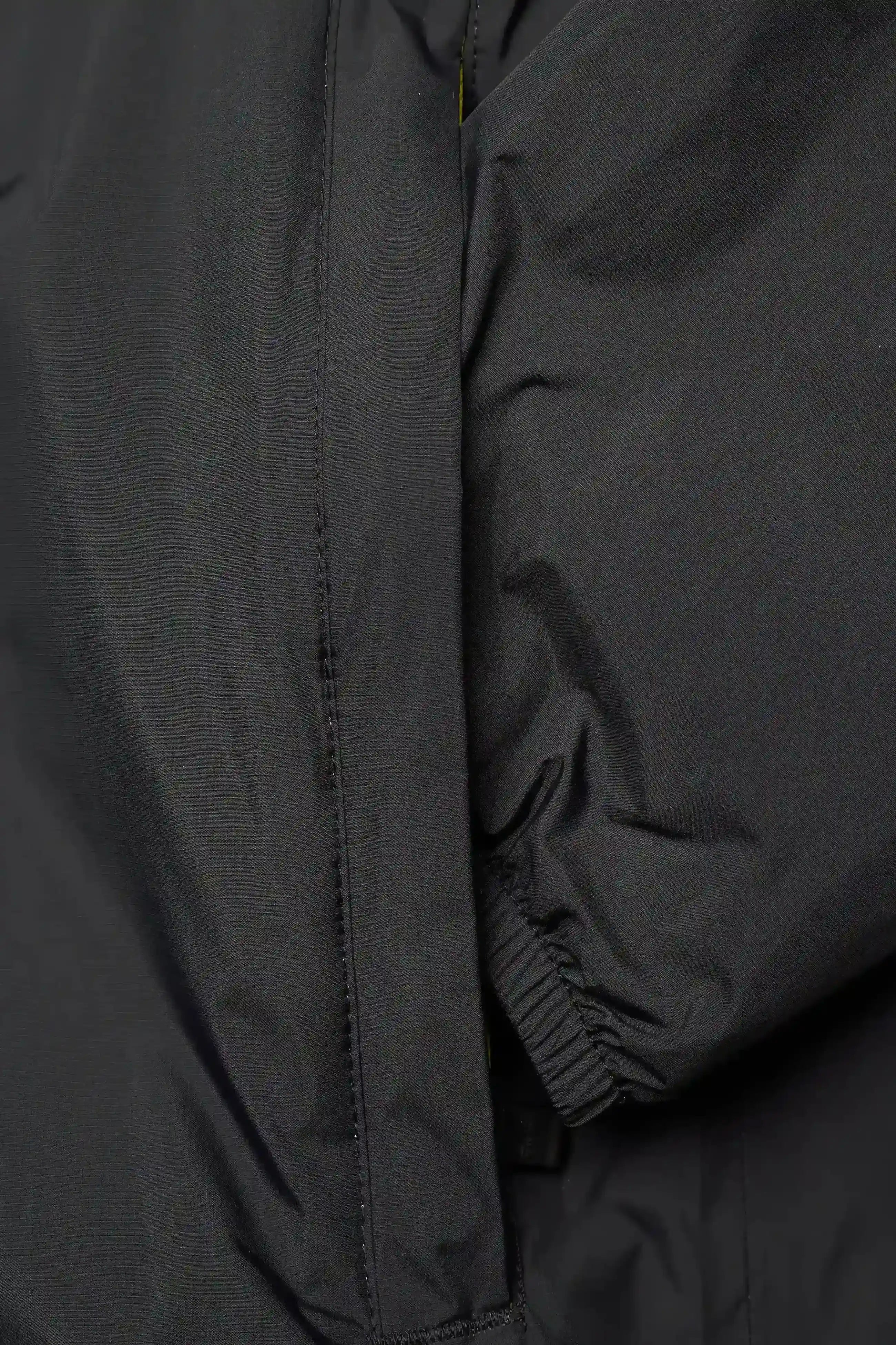 Kway, Mens Jacket, Black, Windbreaker, PrimaLoft, Side Pockets, Full Zip, Signature Zip Tape, Branded Zippers, Zip Pockets, Hooded, Drawcords, Elasticated Cuffs and Hem, Side Pockets Close-up. 