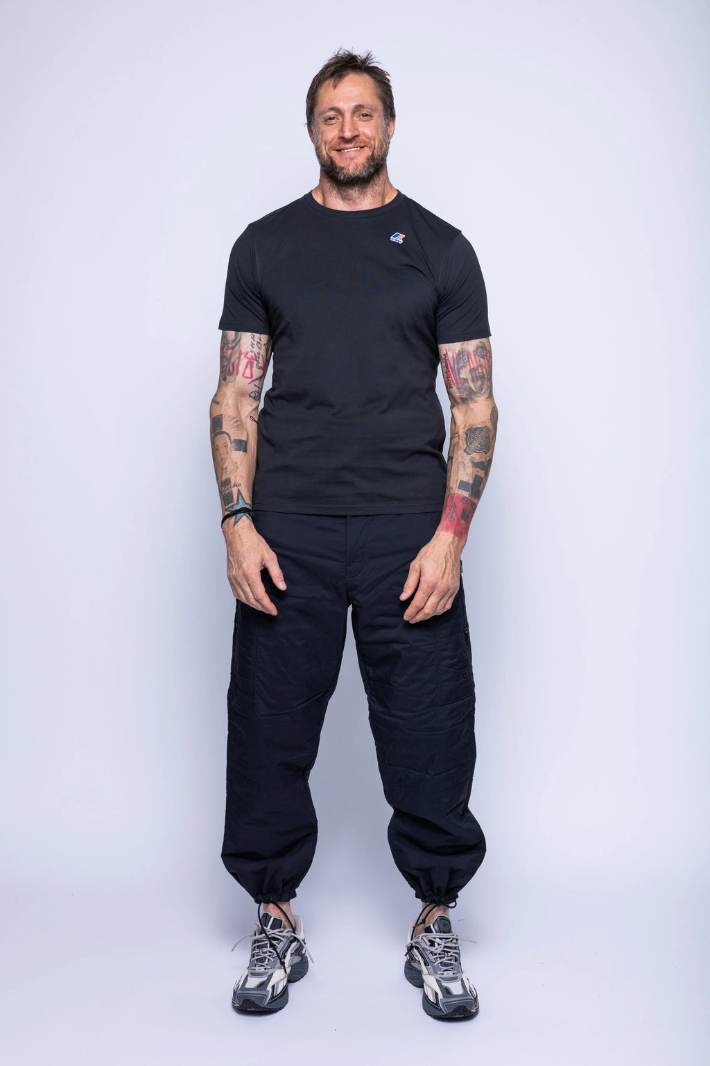 K-Way, Mens T-Shirt, Black, Cotton Jersey, 100% Cotton, Packable, Unisex, Short Sleeves, Zip Bag, Chest Logo, Full Body Front View. 