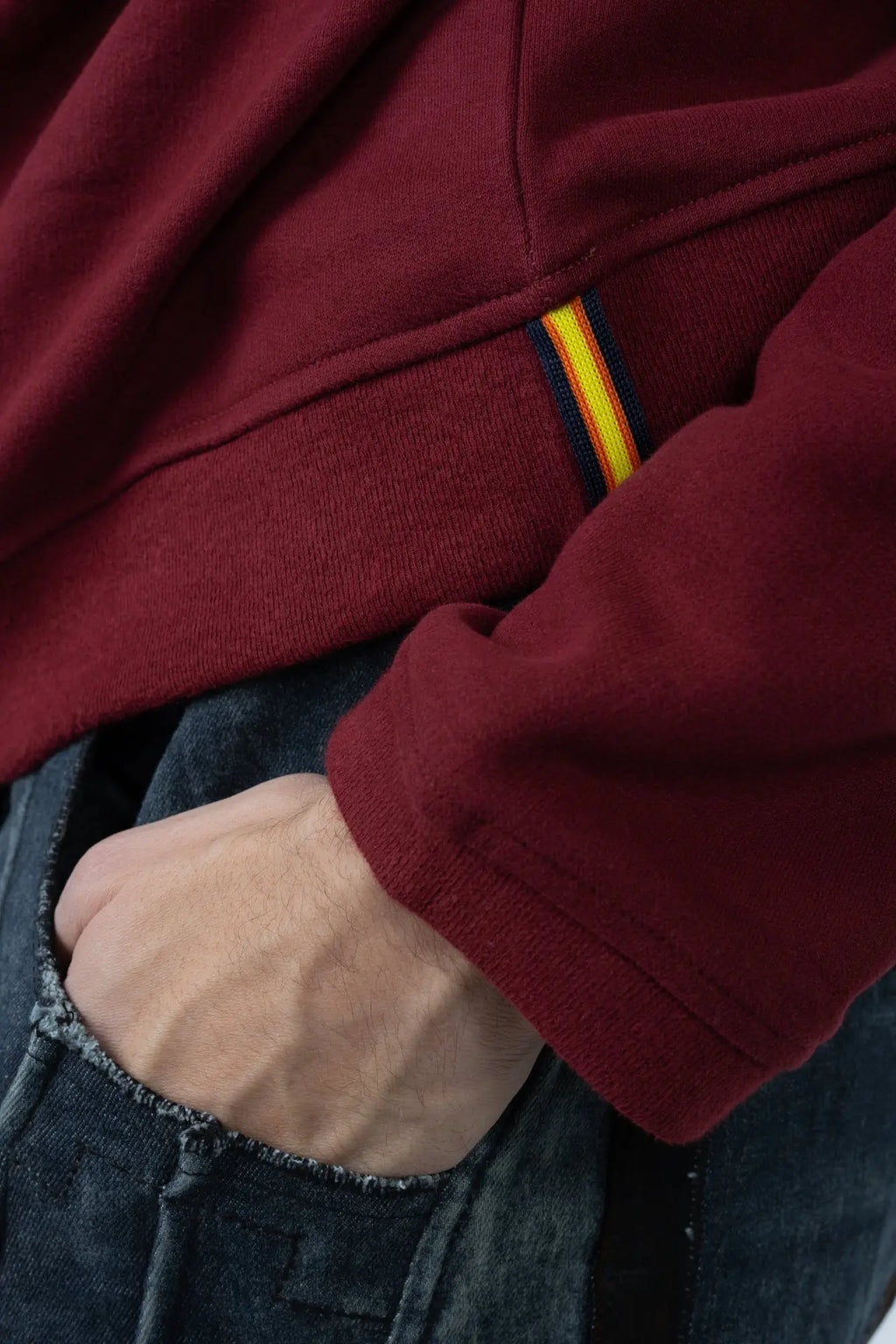 K-Way, Mens Hoodie, Red Syrah, Drawstring, Long Sleeves, Cashmere, Cotton, Dark Red, Elastic Drawcord, Adjustable Hood, CLose-up Hand in Pocket. 