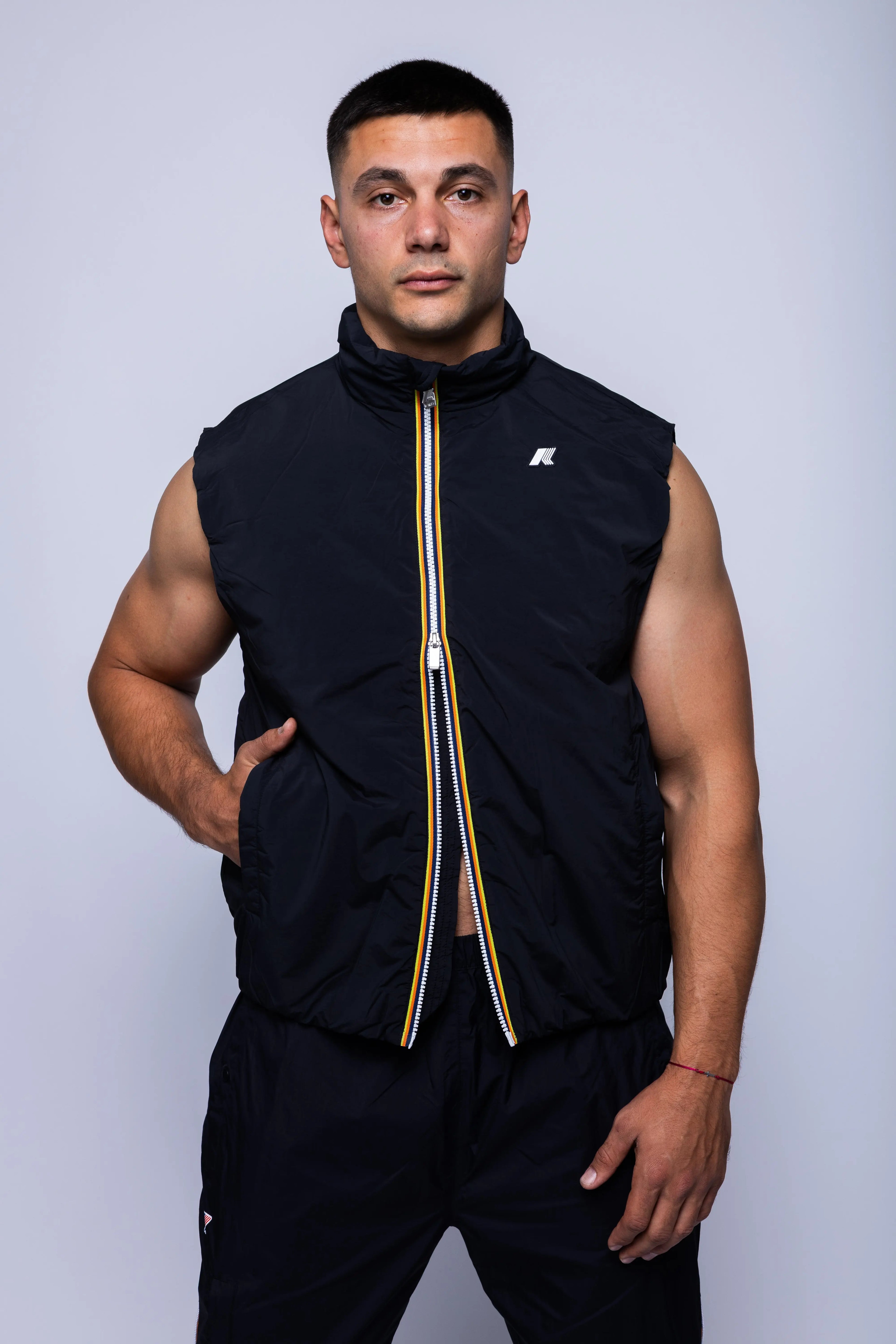 K-Way, Mens Vest Jacket, Black Pure, Sleeveless, Full Zip, Concealed Hood, Chest Logo, Branded Zippers, Side Pockets, Front View. 
