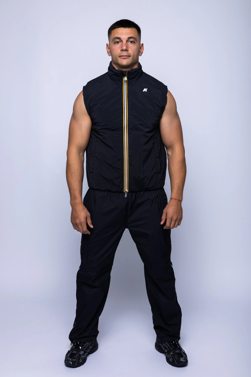 K-Way, Mens Vest Jacket, Black Pure, Sleeveless, Full Zip, Concealed Hood, Chest Logo, Branded Zippers, Side Pockets, Full Body Front View. 