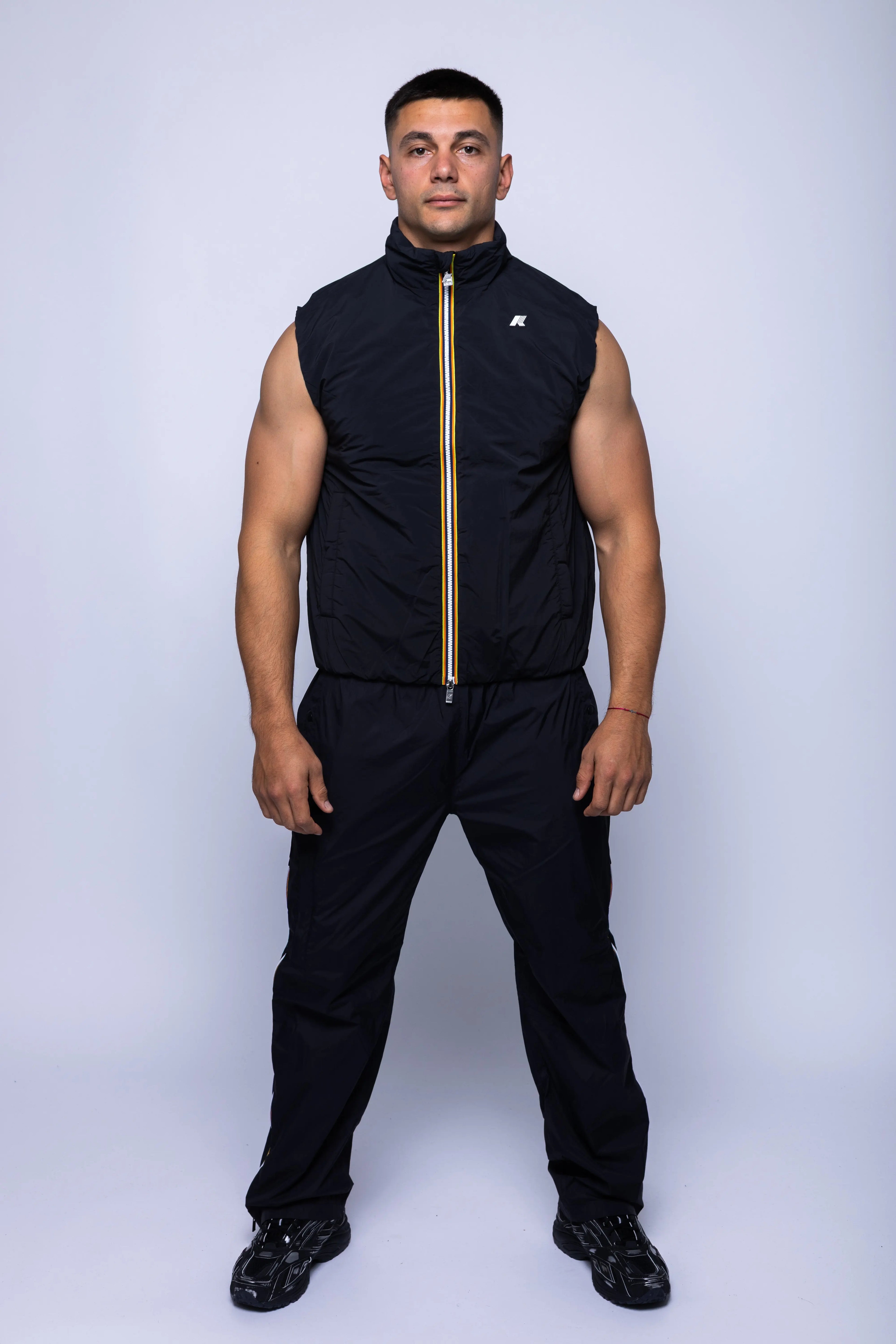 K-Way, Mens Vest Jacket, Black Pure, Sleeveless, Full Zip, Concealed Hood, Chest Logo, Branded Zippers, Side Pockets, Full Body Front View. 