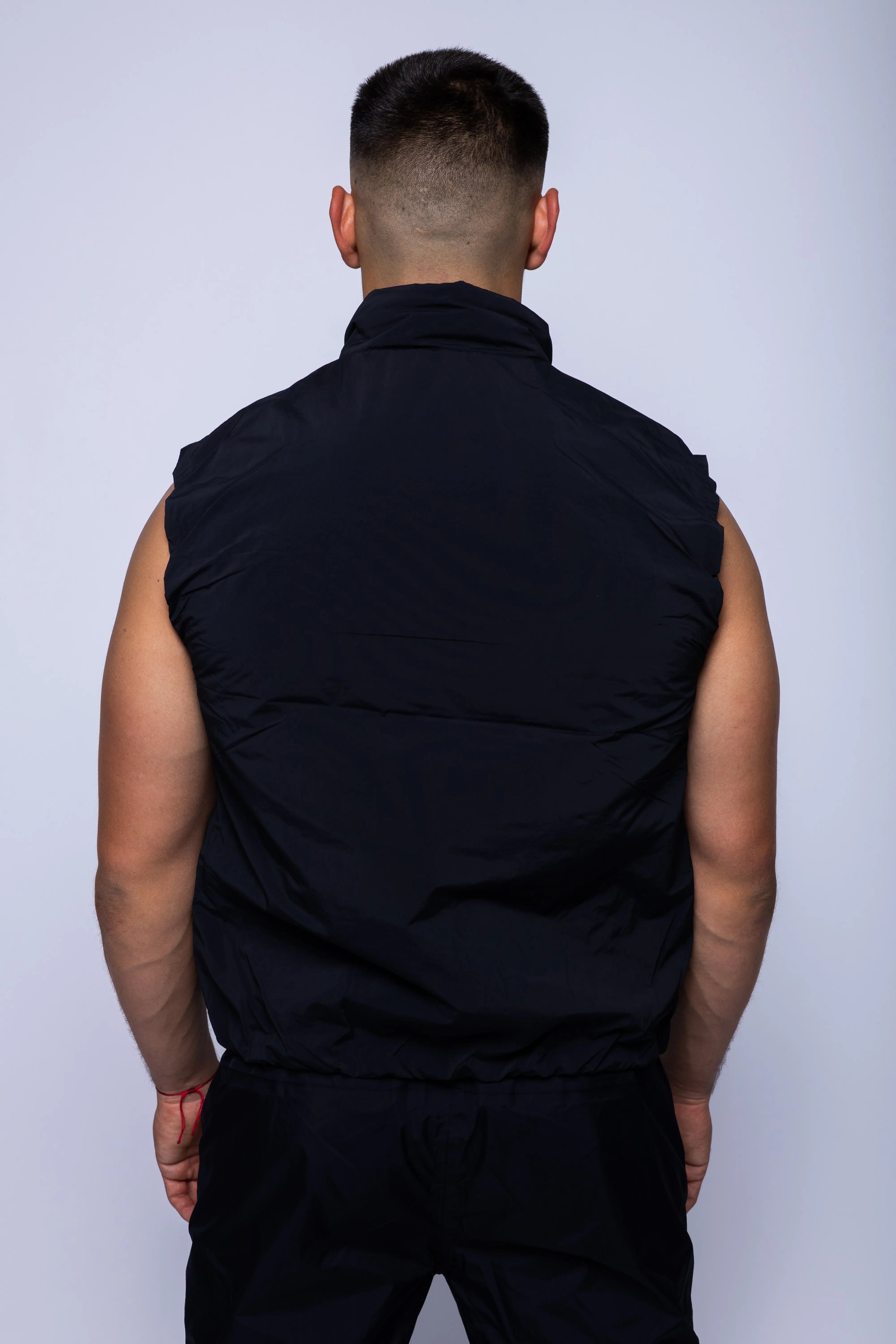 K-Way, Mens Vest Jacket, Black Pure, Sleeveless, Full Zip, Concealed Hood, Chest Logo, Branded Zippers, Side Pockets, Back View. 