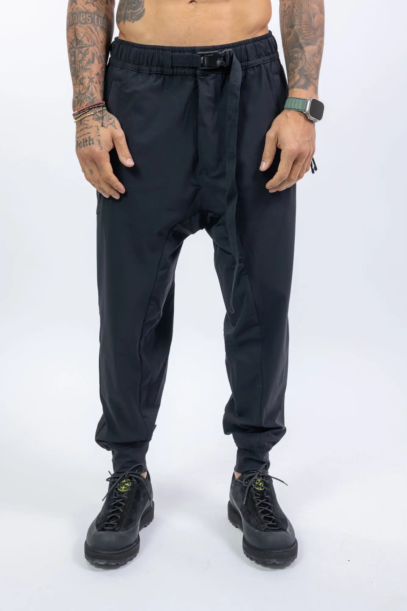 Thom Krom,Mens Trousers,Black,Low Crotch,Integrated Cinch Belt At Waistband,Front Zip Pockets,Back Welt And Cargo Pockets,Concealed Safety Pocket,Power Evo Stretch Fabric,Half Body