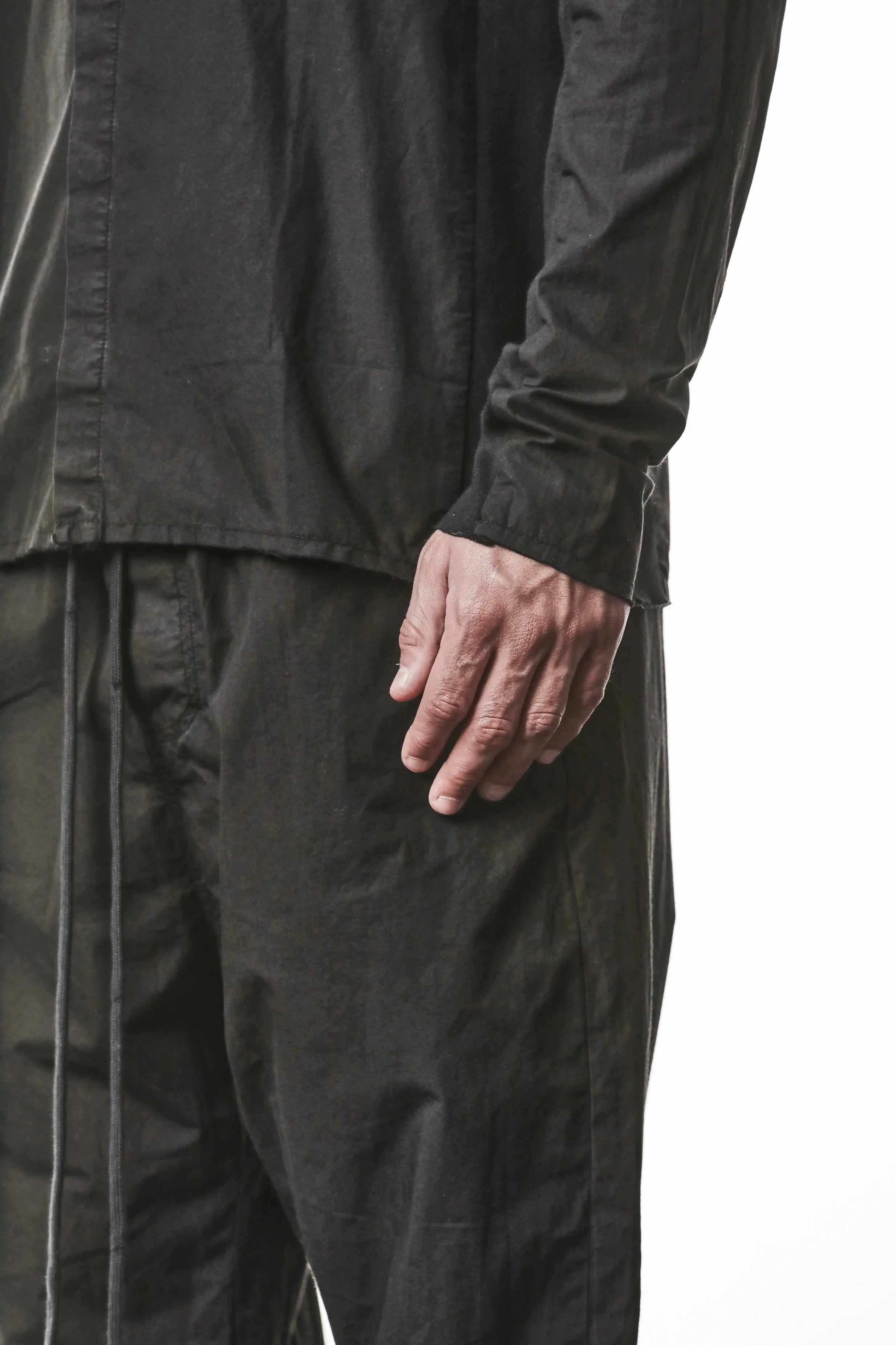 Thom Krom, Mens Shirt, Vegetal Black, Cotton Ribbed Inserts, Raw-cut, Concealed Placket, Buttons, Stand-up collar, 100% Cotton, Garment Dyed, Slim Fit, Top Length Close-up Front 3/4 View. 