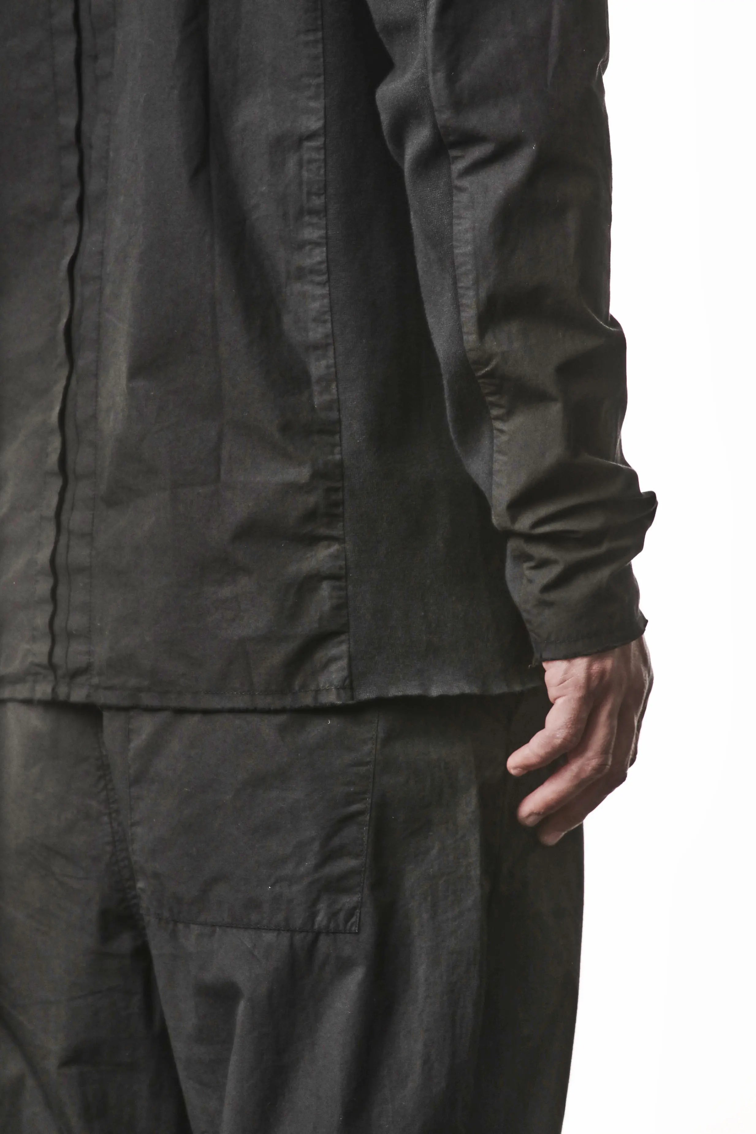 Thom Krom, Mens Shirt, Vegetal Black, Cotton Ribbed Inserts, Raw-cut, Concealed Placket, Buttons, Stand-up collar, 100% Cotton, Garment Dyed, Slim Fit, Close-up Back 3/4 View. 