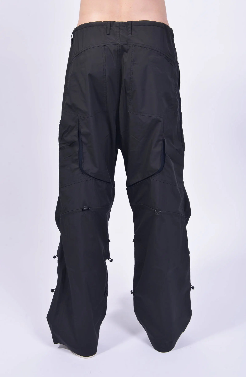 Nilmance, Mens Pants, Black, Ventilation Mesh Inserts, Side Pockets, Double Back Pockets, Elasticated Legs, Elasticated Ankles, Drawcord Waistband, Belt Loops, Elasticated Knee Modules, Snap Fastening Knee Panels, Fully Customizable, Back Portrait View. 