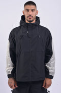 Nilmance, Mens Jacket, Black, Full-Zip, Hooded, YKK Zippers, Side Pockets, Waterproof, Windproof, Water-Repellent, Elasticated Cuffs, Black and White, Zip Pockets, Velcro, Front Portrait. 