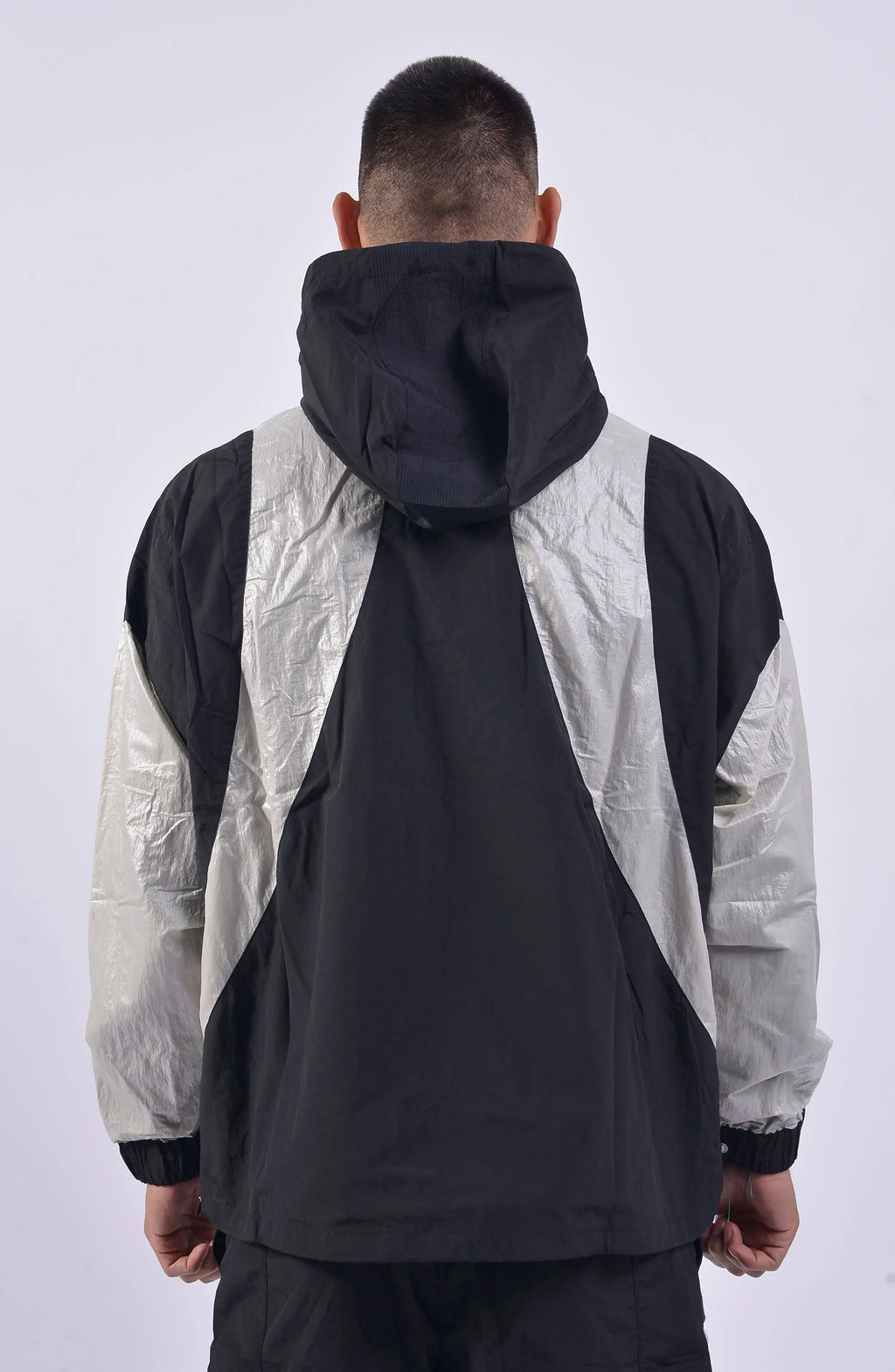 Nilmance, Mens Jacket, Black, Full-Zip, Hooded, YKK Zippers, Side Pockets, Waterproof, Windproof, Water-Repellent, Elasticated Cuffs, Black and White, Zip Pockets, Velcro, Back Portrait. 