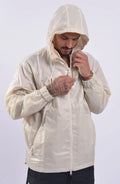 Nilmance, Mens Jacket, Ivory, Full-Zip, Hooded, YKK Zippers, Side Pockets, Waterproof, Windproof, Water-Repellent, Elasticated Cuffs, Zip Pockets, Velcro, Snap Buttons, Front Portrait Hooded Zipped up. 