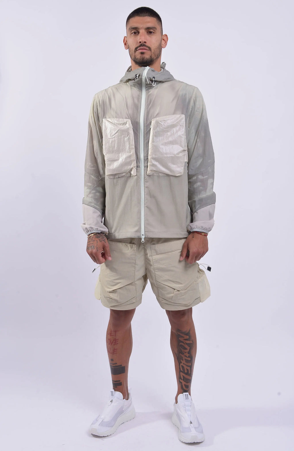 Nilmance, Mens Jacket, Ivory, Thermo Sensitive, Water-Repellent, Centre Zip Closure, Full-Zip, Bellows Zip Pockets, Elasticated Cuffs, Elastic Drawcord Hood, Zipper Ending at hood, YKK Zippers, Full Body Front View. 