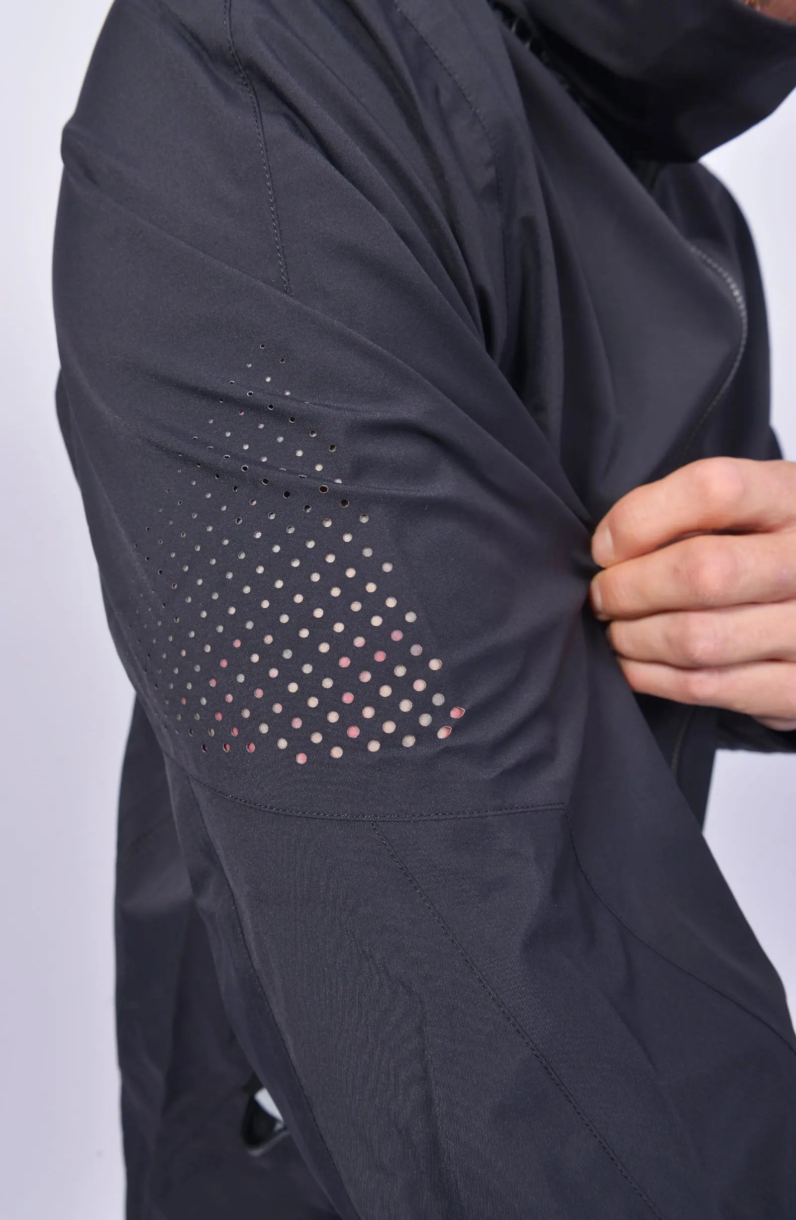 Nilmance, Mens Jacket, Black, Hooded, Waterproof 10k, Water-Repellent, Long Sleeves, Side Pockets, Zip Pockets, Velcro Adjustable Cuffs, Full-Zip, Centre Front Zip Opening, YKK Zippers, Elastic Drawcord, Rear-Adjustable Hood, Laser Cut Holes for Ventilation, Breathable, Sleeve Ventilation Showcase. 
