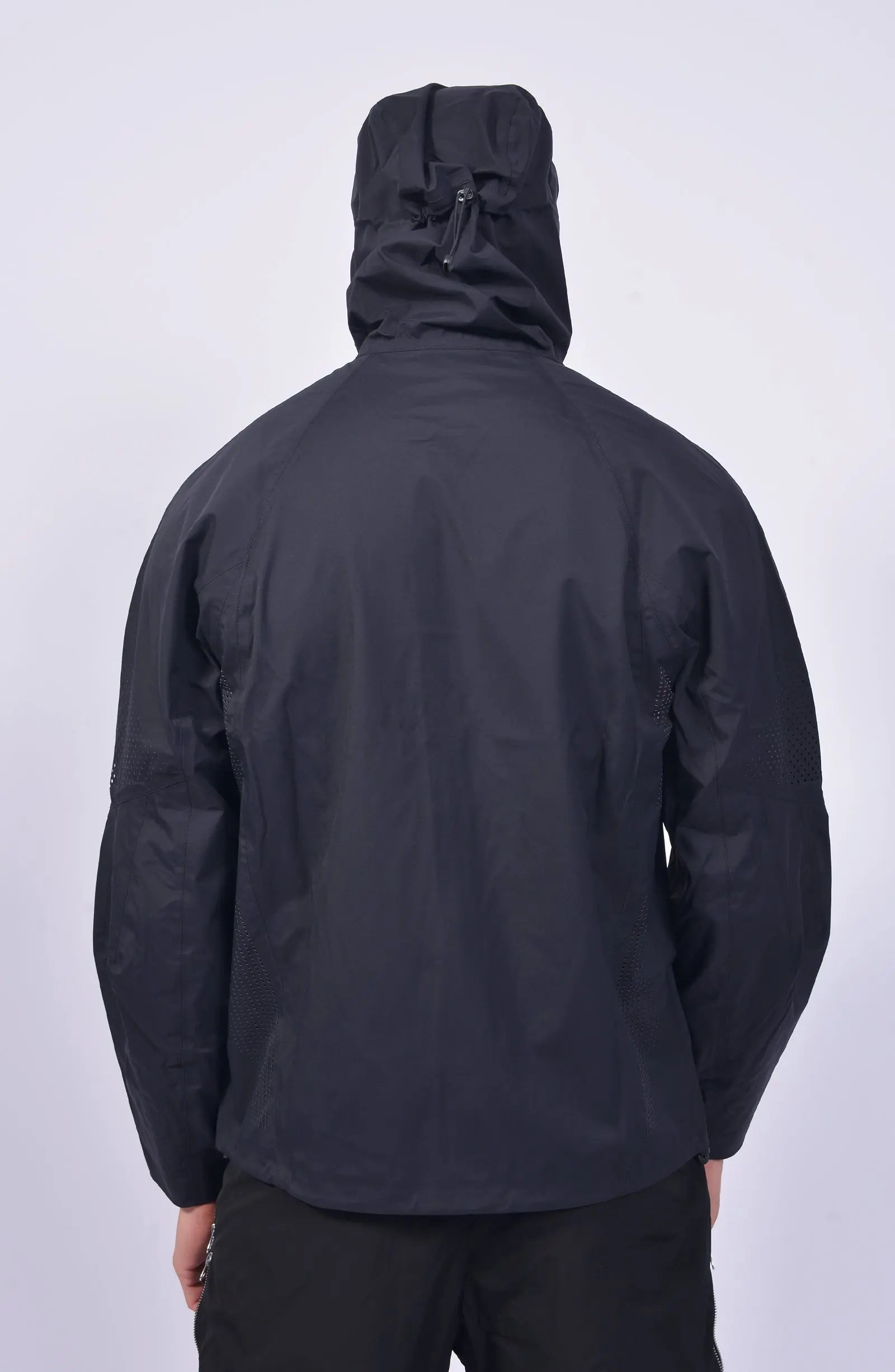 Nilmance, Mens Jacket, Black, Hooded, Waterproof 10k, Water-Repellent, Long Sleeves, Side Pockets, Zip Pockets, Velcro Adjustable Cuffs, Full-Zip, Centre Front Zip Opening, YKK Zippers, Elastic Drawcord, Rear-Adjustable Hood, Laser Cut Holes for Ventilation, Breathable, Hooded Back Portrait. 