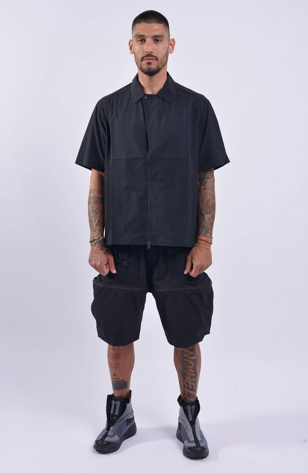 Nilmance, Mens Shirt, Black, Lazer Cut, Short Sleeves, Spread Collar, Full-Zip, YKK Zippers, Ventilation Holes, Wide-Fit, Oversized, Water-Repellent, Full Body Front View. 