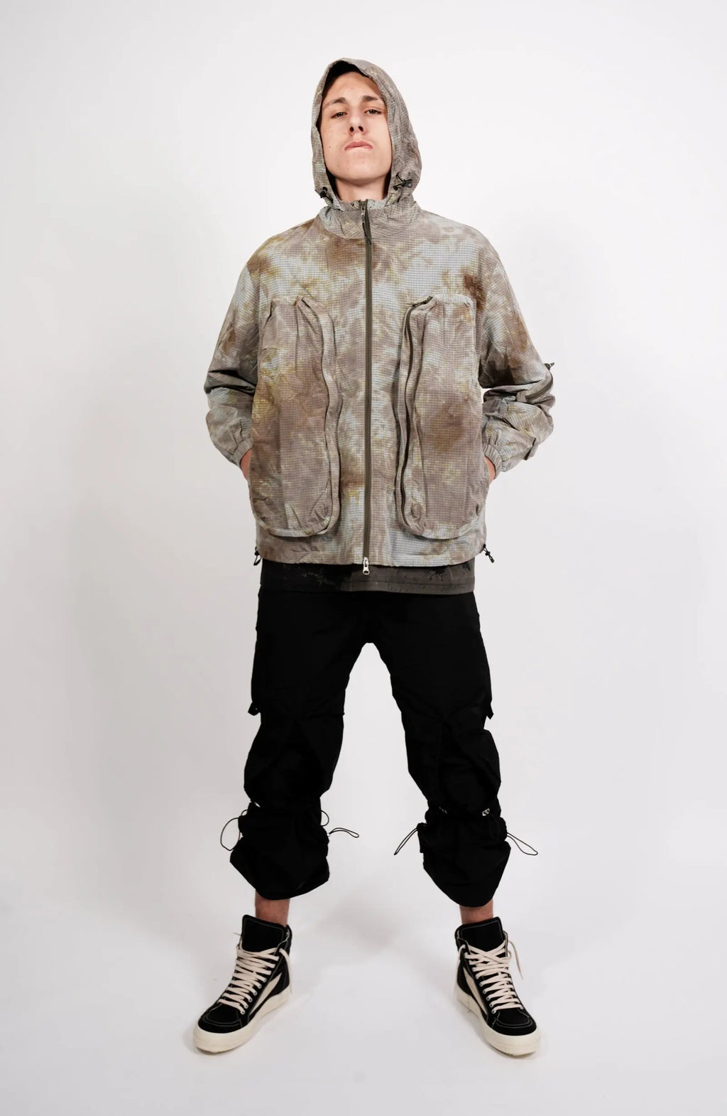 Nilmance, Mens Jacket, Garment Dyed, Grey, Brown, Acid, Cargo Pockets, Side Pockets, Hooded, Drawcord, Elastic Cuffs, Full Zip, Zip Pockets, YKK Zippers, Large Bellows Pockets, Full Body Front View. 