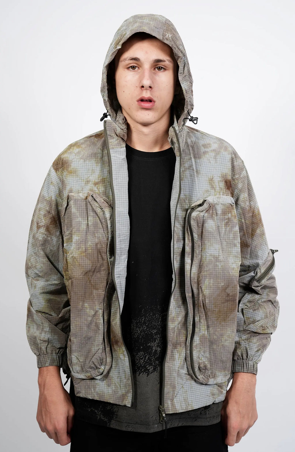 Nilmance, Mens Jacket, Garment Dyed, Grey, Brown, Acid, Cargo Pockets, Side Pockets, Hooded, Drawcord, Elastic Cuffs, Full Zip, Zip Pockets, YKK Zippers, Large Bellows Pockets, Front Unzipped View. 