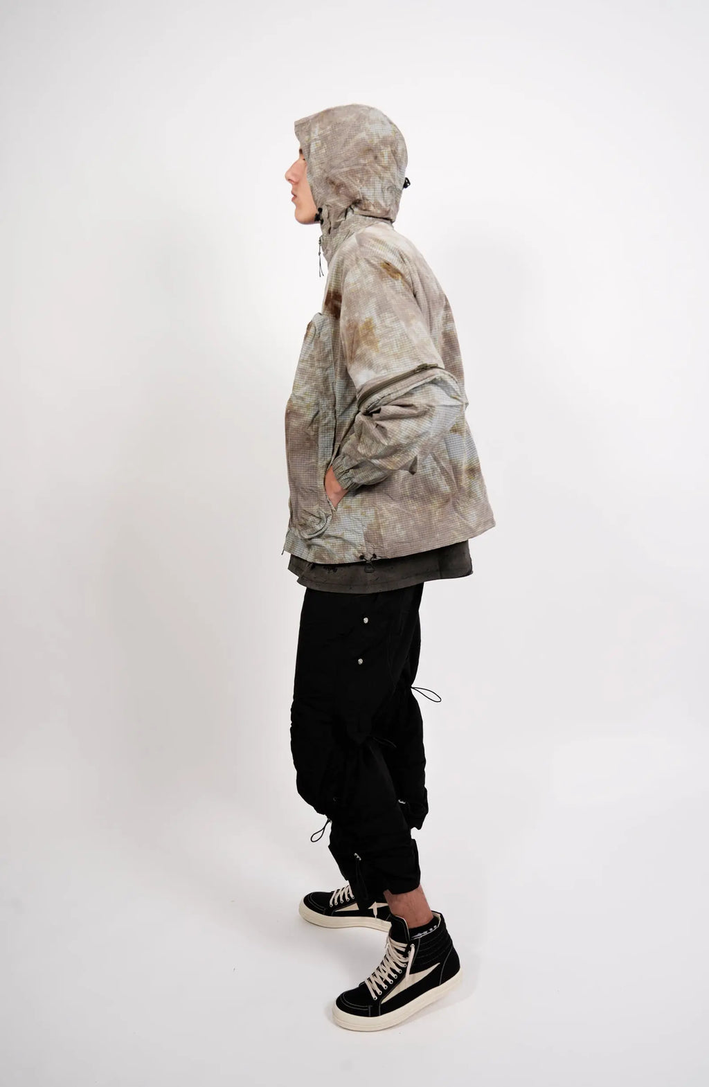 Nilmance, Mens Jacket, Garment Dyed, Grey, Brown, Acid, Cargo Pockets, Side Pockets, Hooded, Drawcord, Elastic Cuffs, Full Zip, Zip Pockets, YKK Zippers, Large Bellows Pockets, Full Body Side View. 
