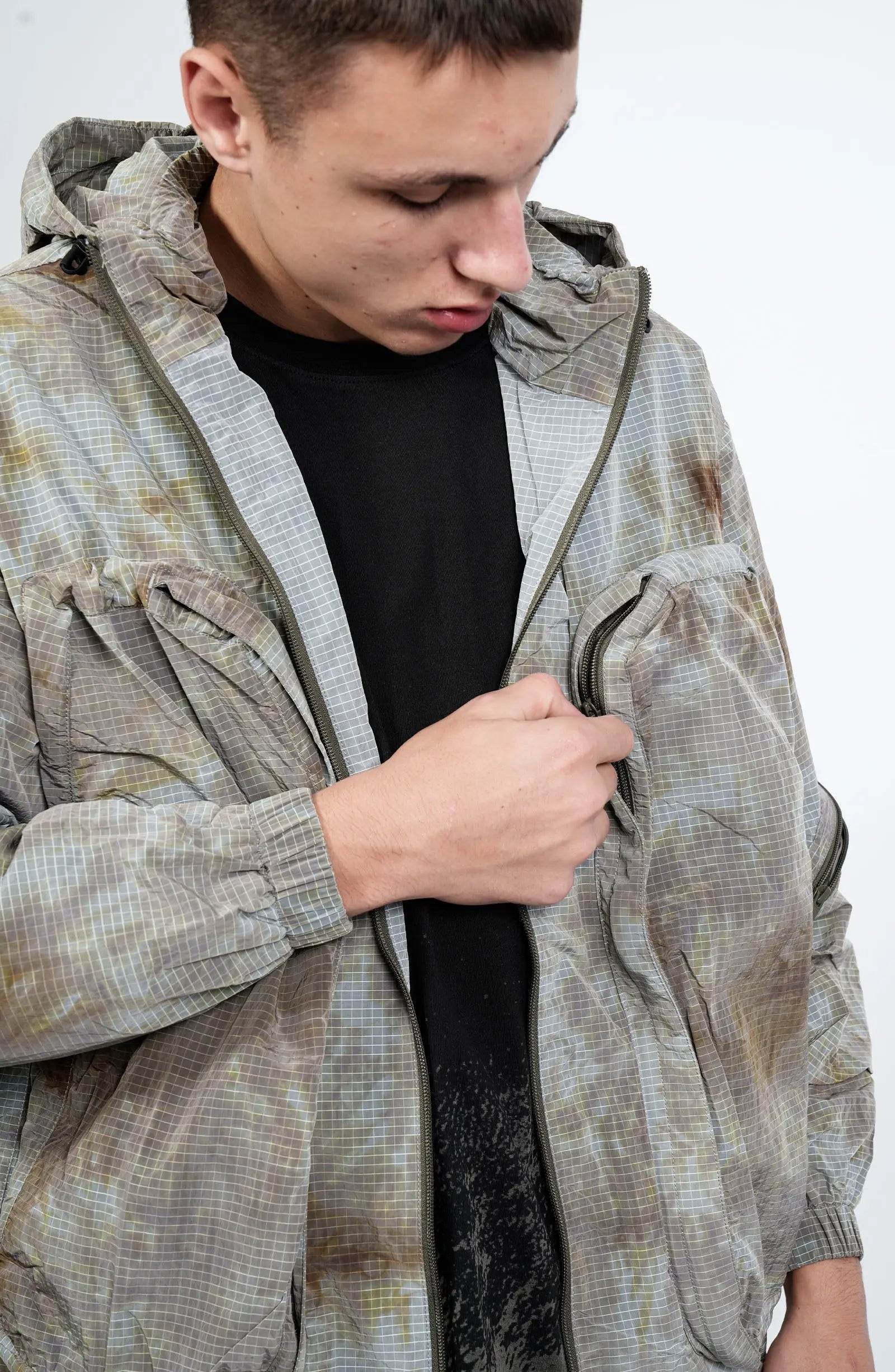 Nilmance, Mens Jacket, Garment Dyed, Grey, Brown, Acid, Cargo Pockets, Side Pockets, Hooded, Drawcord, Elastic Cuffs, Full Zip, Zip Pockets, YKK Zippers, Large Bellows Pockets, Holding Pocket Zip Slider. 