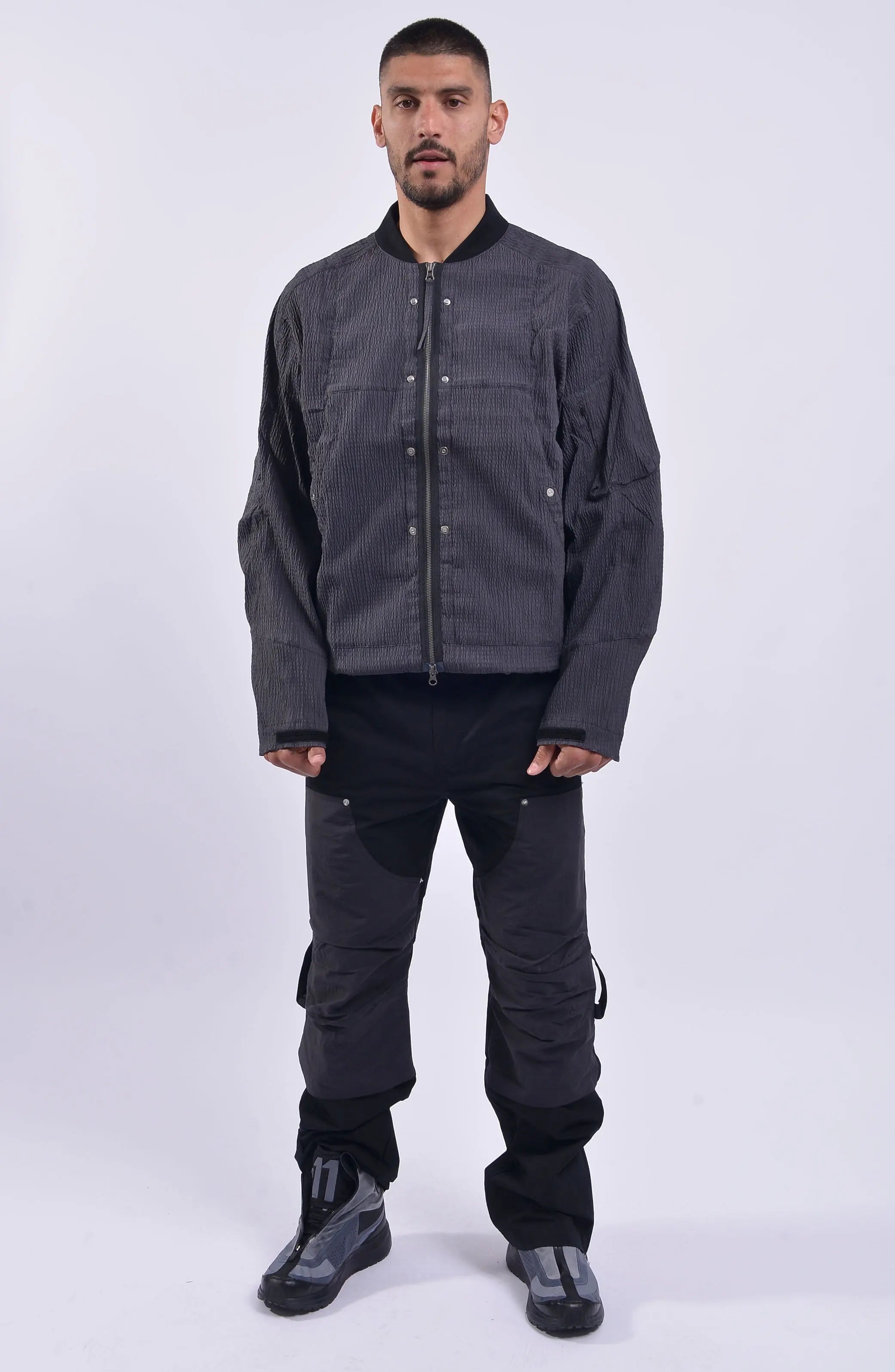 Nilmance, Mens Bomber Jacket, Grey, Black, Reversible, Water-Repellent, Centre Zip Closure, Full-Zip, Lining Zip, Vest Lining, Long Sleeves, Adjustable Cuffs, Velcro, YKK Zippers, Side Zip Pockets, Round Neck, Snap Fastening, Chest Pockets, Full Body Front View. 
