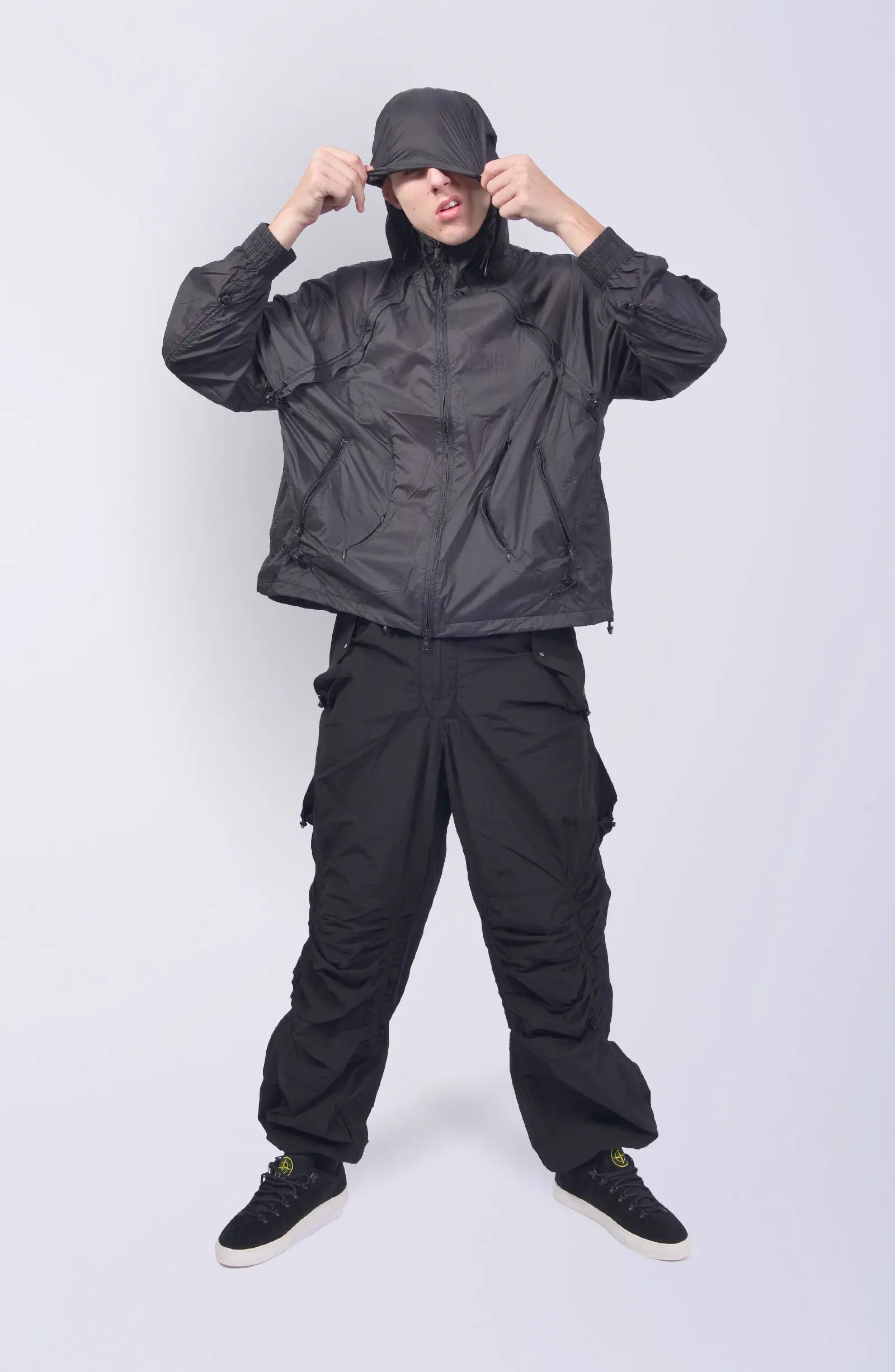 Nilmance, Mens Jacket, Transparent, Light Grey, Gray, Full Zip, Zip Ventilation Openings, Elasticated Cuffs, Cinch Hood, Drawcord Hood, Side Zip Pockets, Lightweight, Windproof, Full Body Hooded View. 