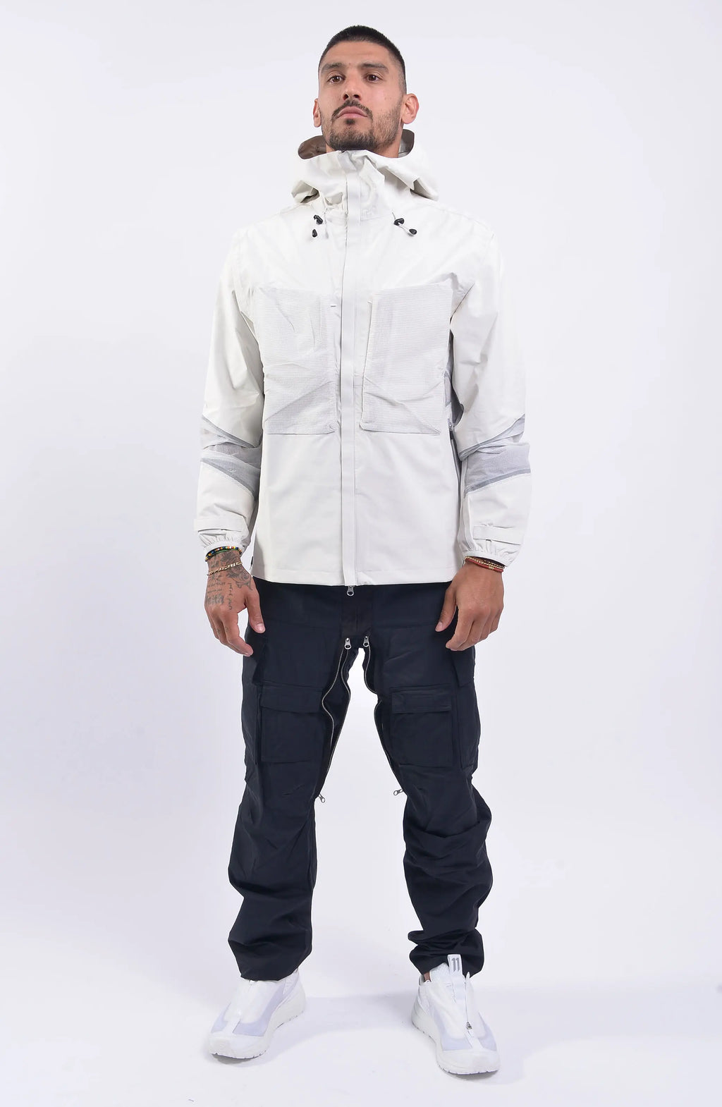 Nilmance, Mens Jacket, White, Hooded, Elasticateed Drawcord, Full Zip, Ripstop Bellows Pockets, YKK Zippers, YKK METALUXE®, YKK AQUAGUARD®, Vislon, Elasticated Cuffs, Waterproof, Windproof, Taped Seams, Laminated Fabric, Zip Pockets, Full Body Front View. 