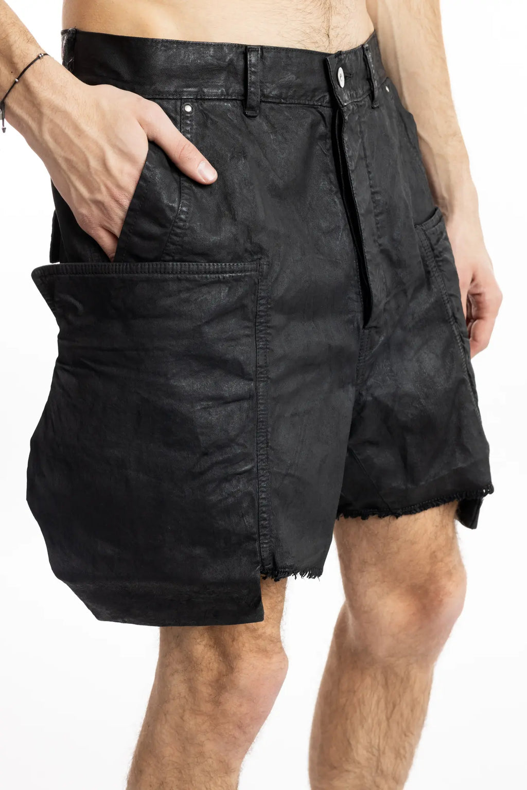 Rick Owens, cargo mens shorts, oversized, side pockets, raw hem , distressed look, Rick Owens Button, Zip Fly, Close-up. 