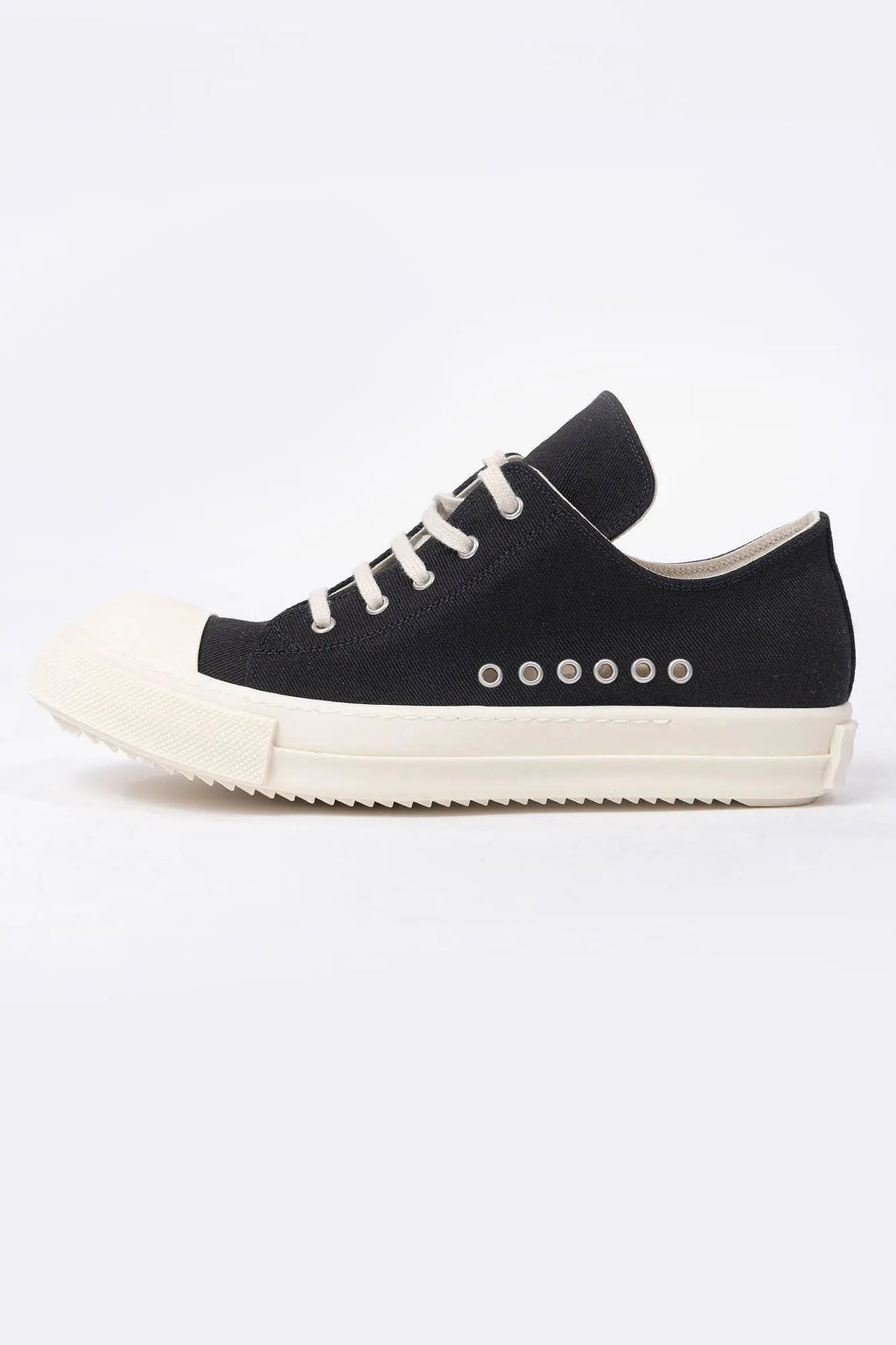 Rick Owens DRKSHDW, Mens Sneakers, Black Milk, Denim Sneakers with Rubber Soles, Signature Cunt Lettering at Heels, Lace-up low top, White Rubber, DRKSHDW Lettering on insoles, Breathability Holes, Side View. 