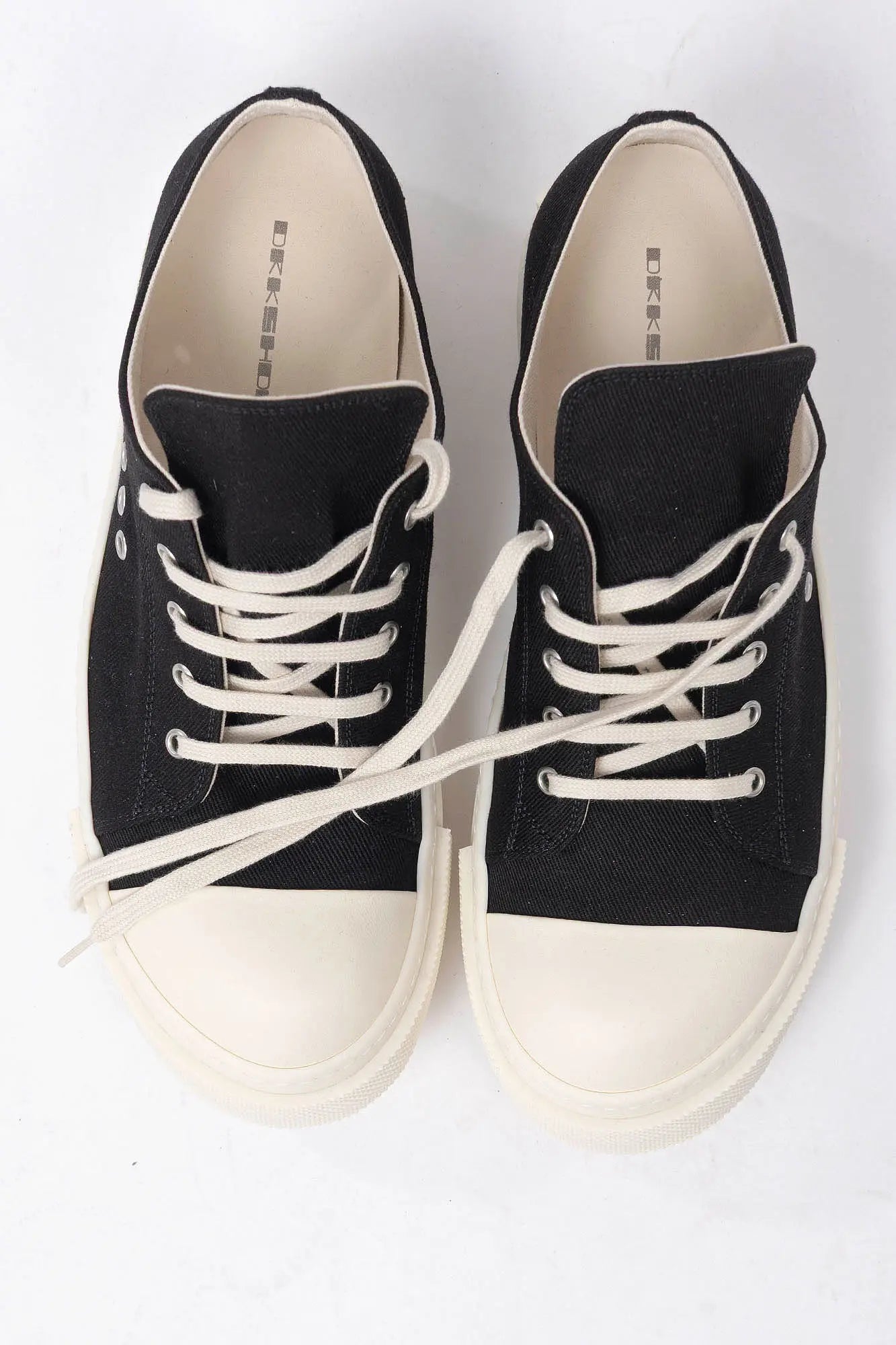 Rick Owens DRKSHDW, Mens Sneakers, Black Milk, Denim Sneakers with Rubber Soles, Signature Cunt Lettering at Heels, Lace-up low top, White Rubber, DRKSHDW Lettering on insoles, Top-Down View. 